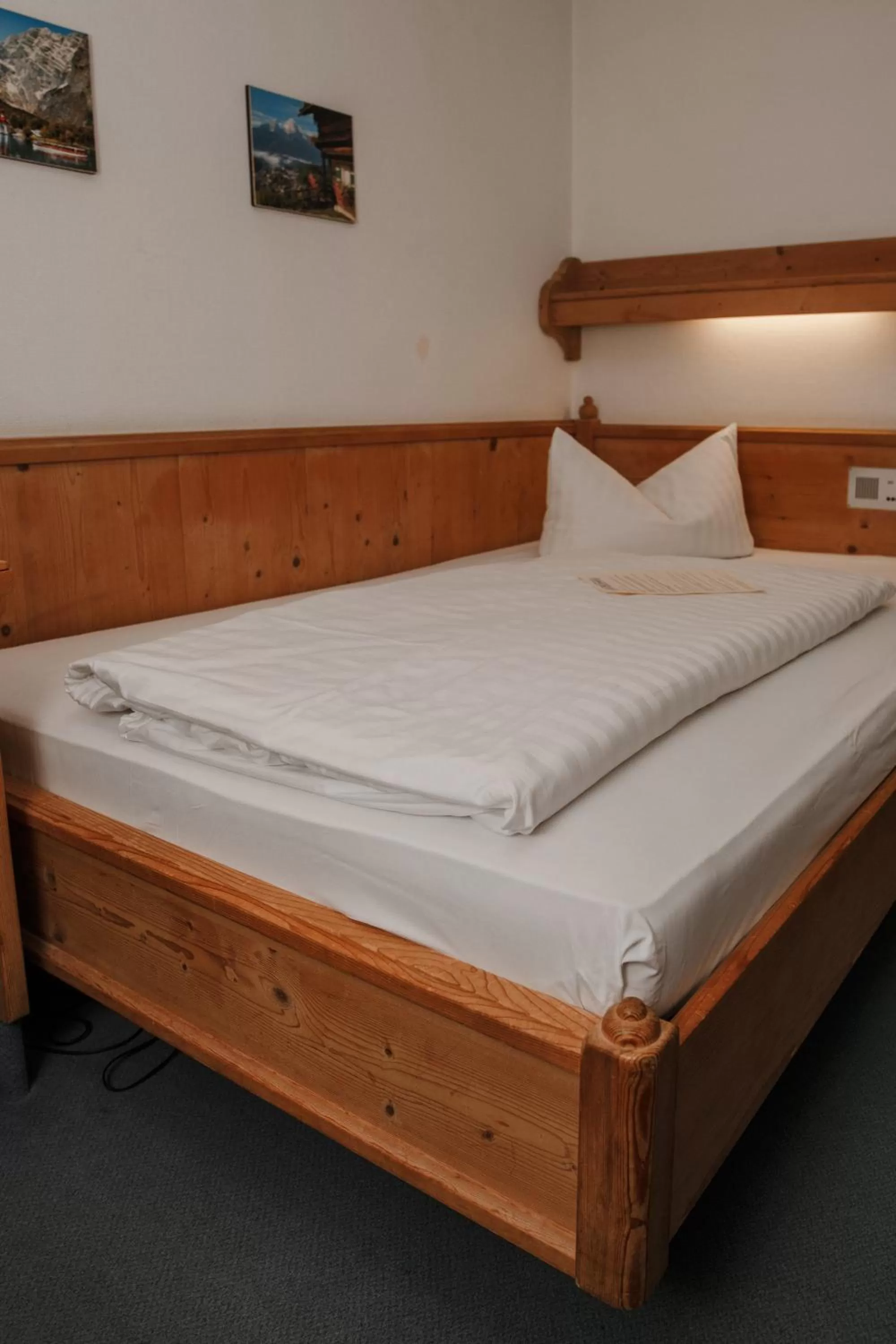 Bed in Hotel Vier Jahreszeiten