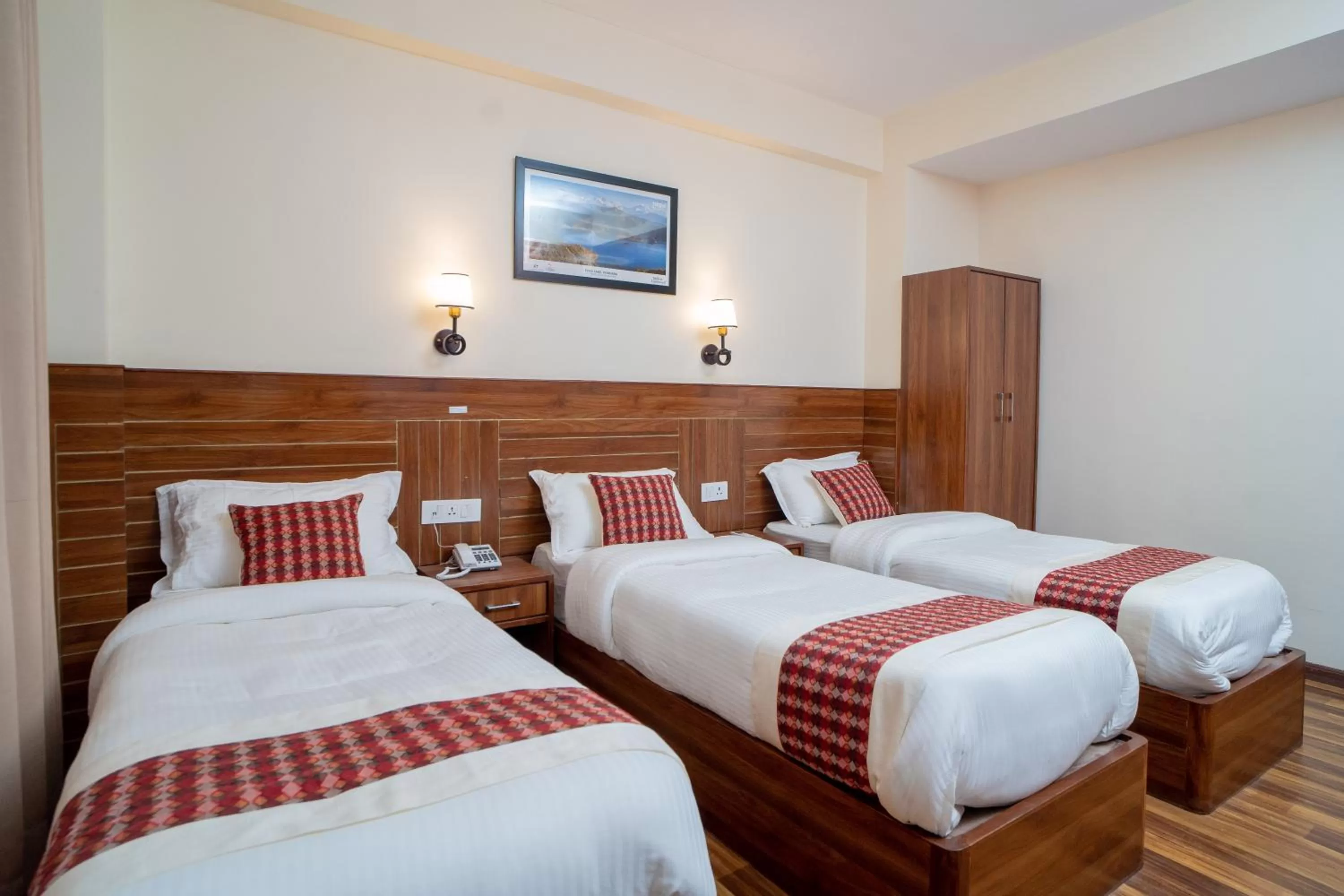 Bed in Madhuban Hotel