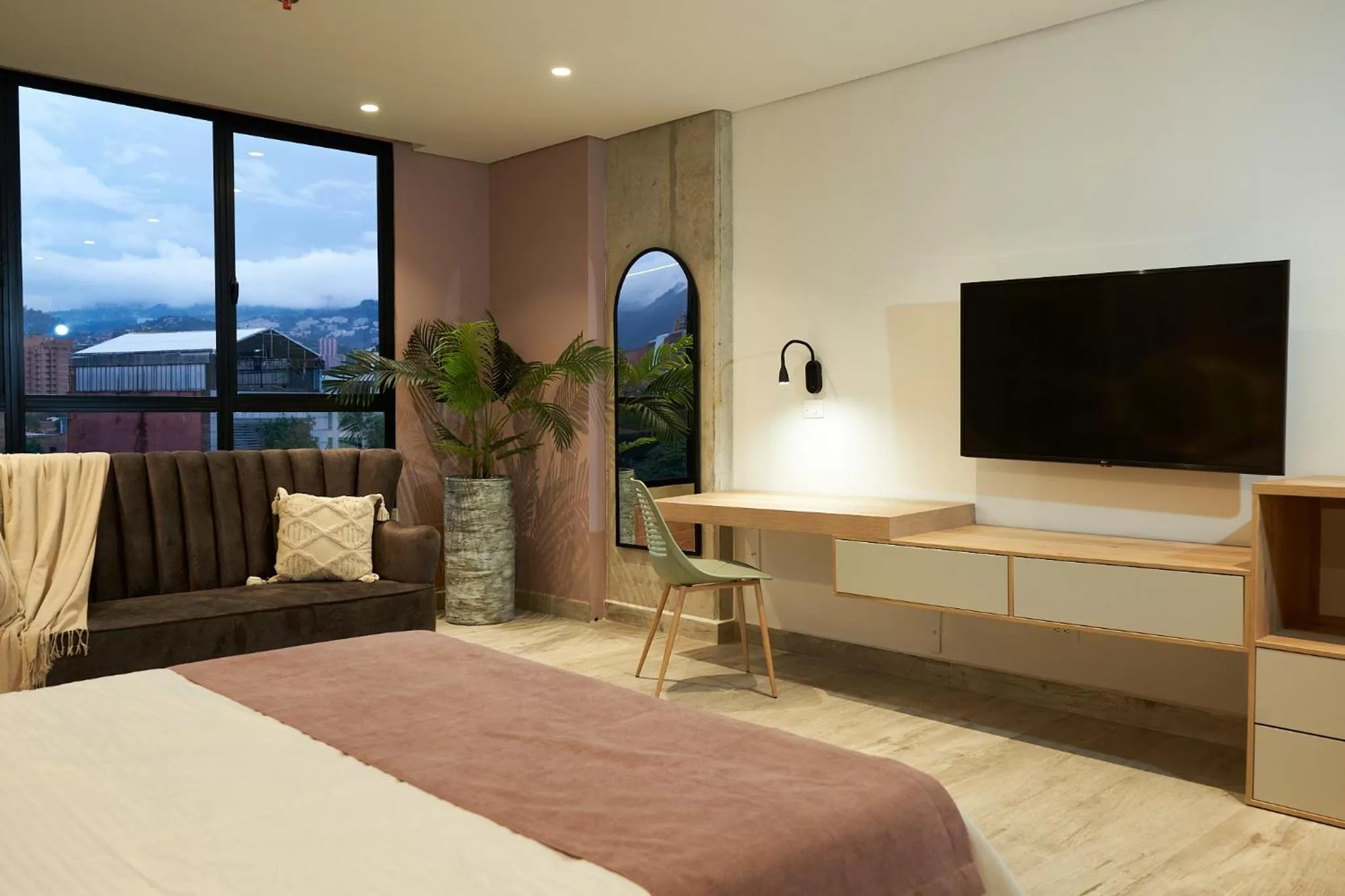 Seating area, Bed in Eutopiq Hotel