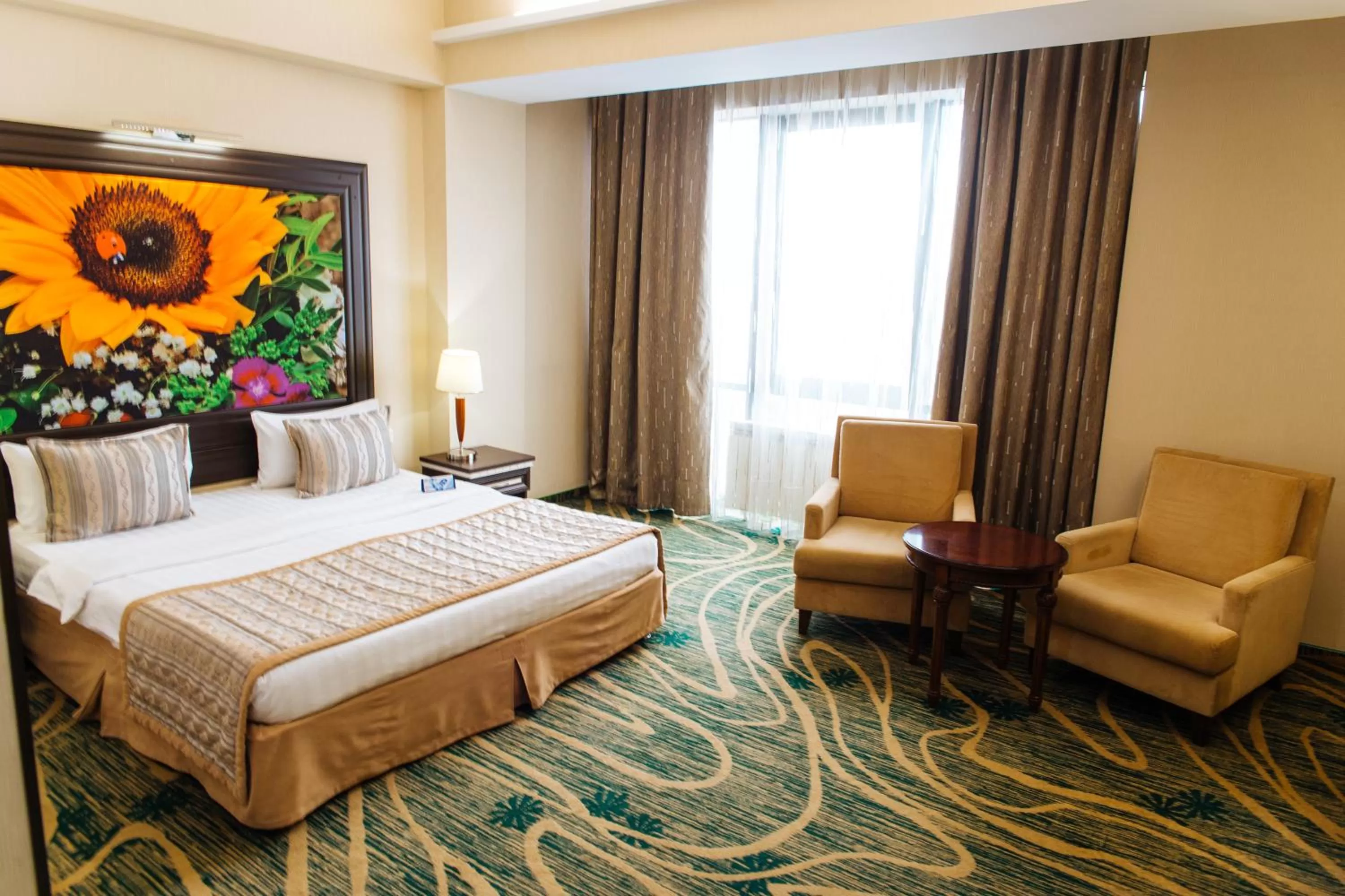 Bed in Hotel Kazzhol Almaty