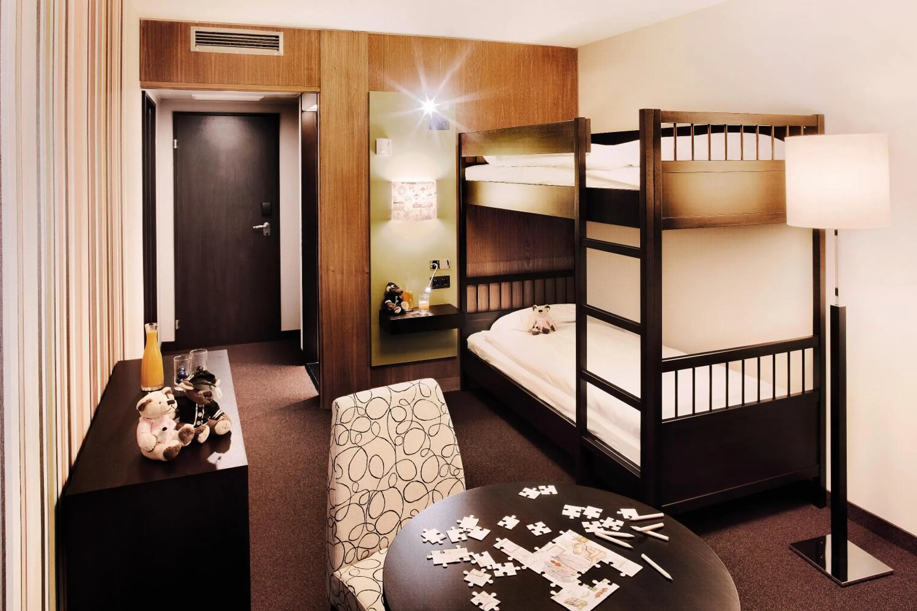 Family Room with 2 Frend Beds 140x200 and 2 Bunk Beds in Moevenpick Hotel Egerkingen