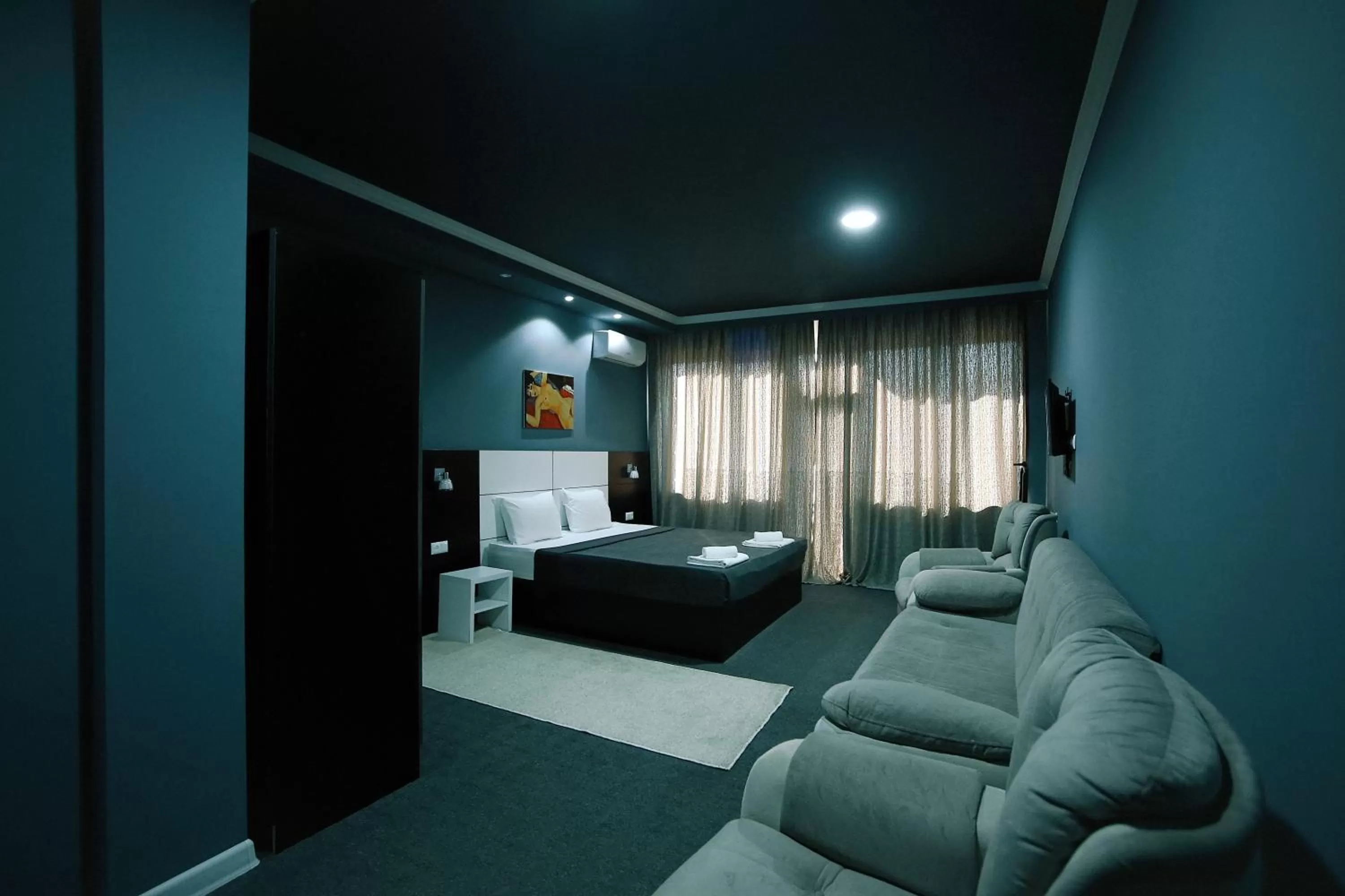 Bed, Seating Area in Hotel Rero