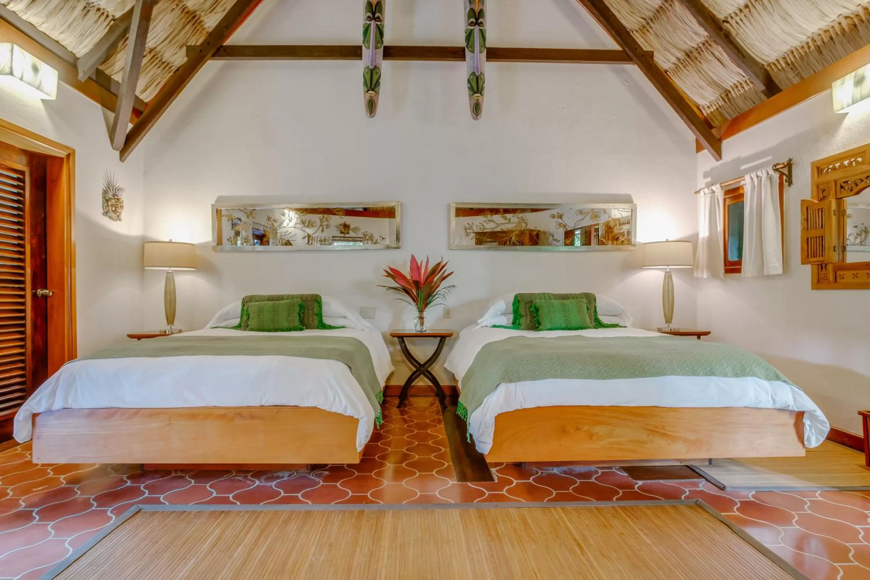 Bed in The Lodge at ChaaCreek