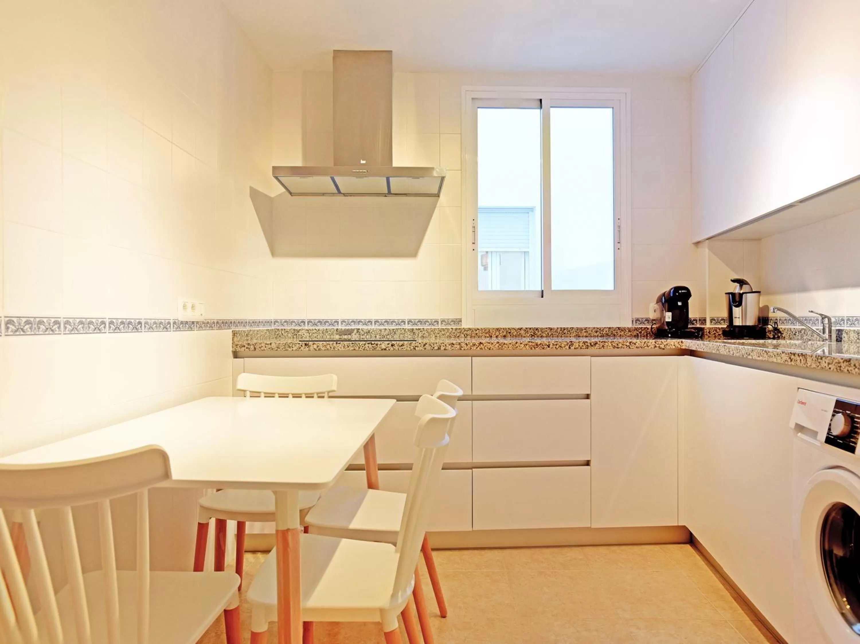 Kitchen or kitchenette in Apartamentos Santiago