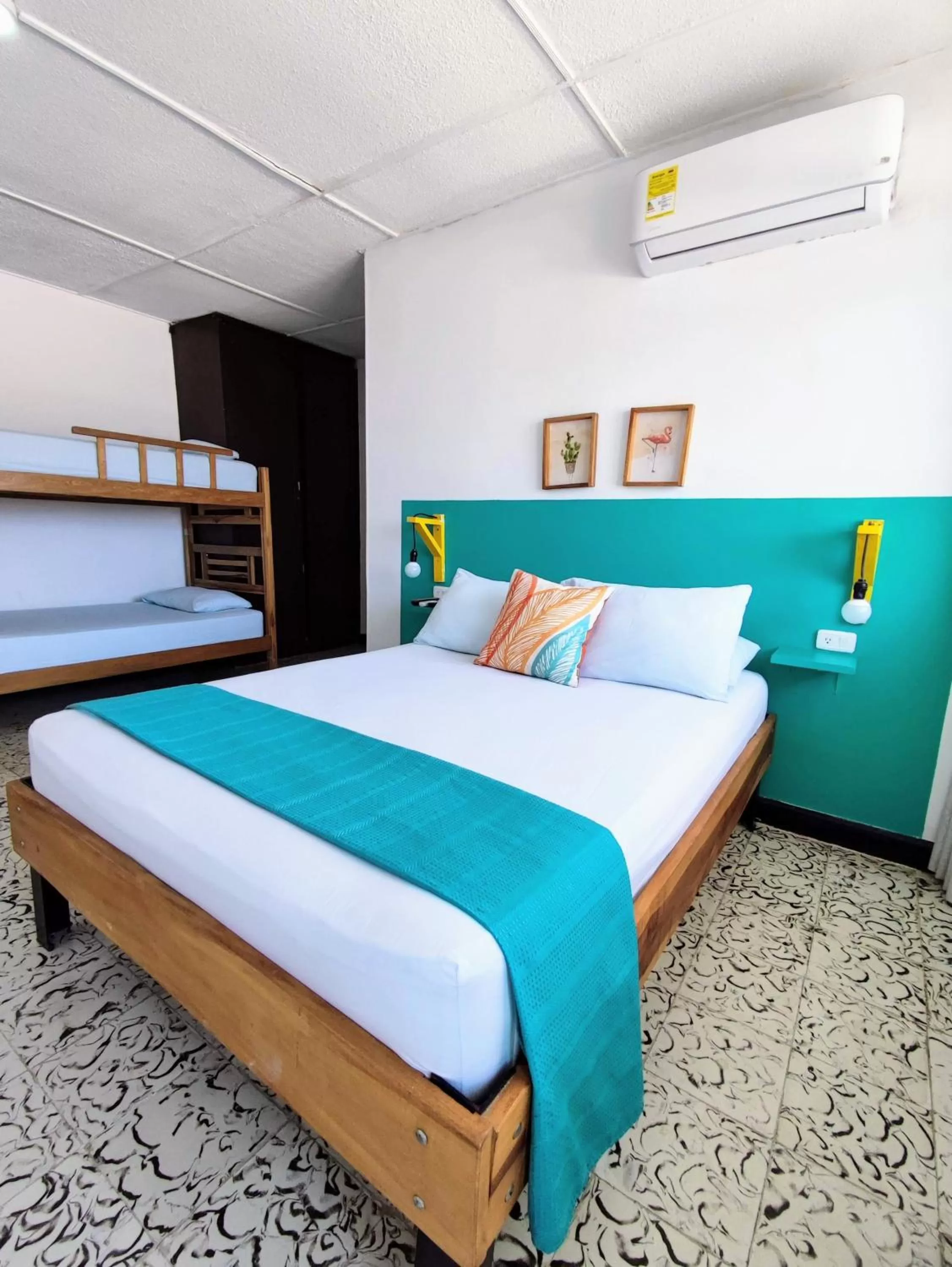 Bed in Bona Vida Hotel