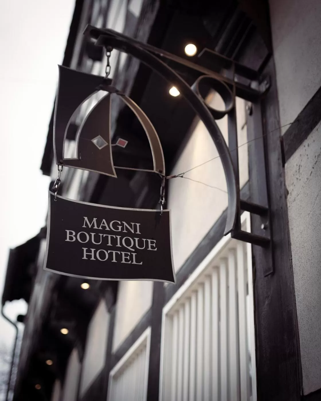 Property logo or sign in Magni Boutique Hotel