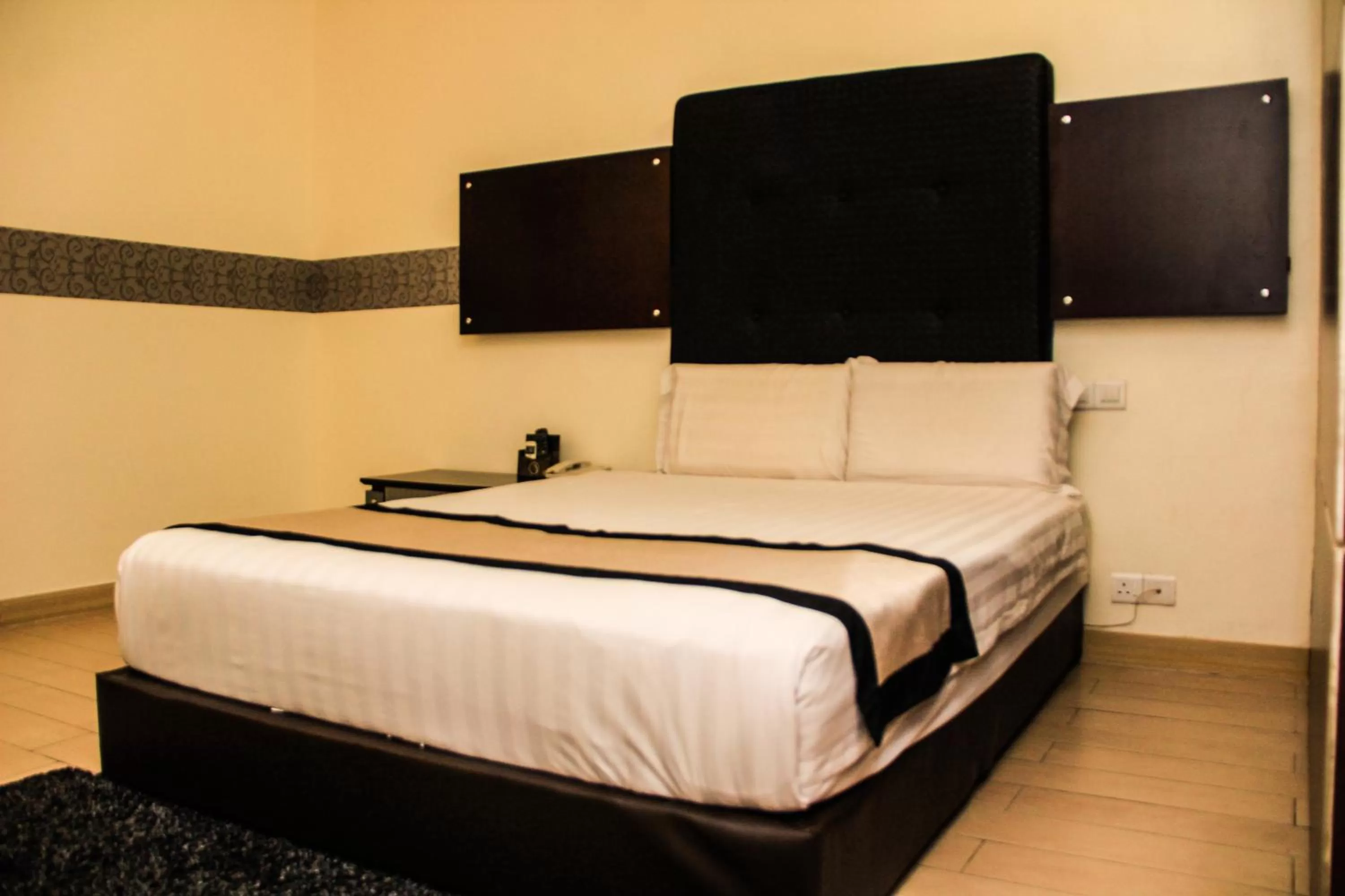 Bed in Shervinton Executive Boutique Hotel