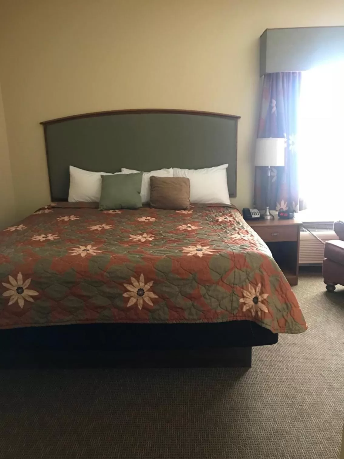 Bed in Randolph Inn and Suites