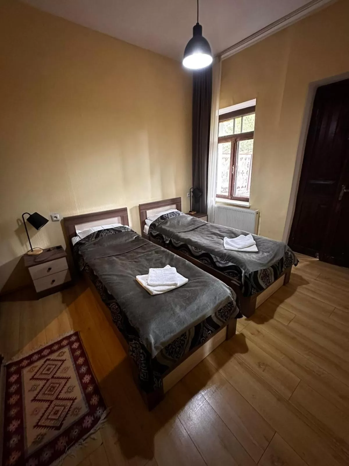 Bed in Villa Mestia Hotel