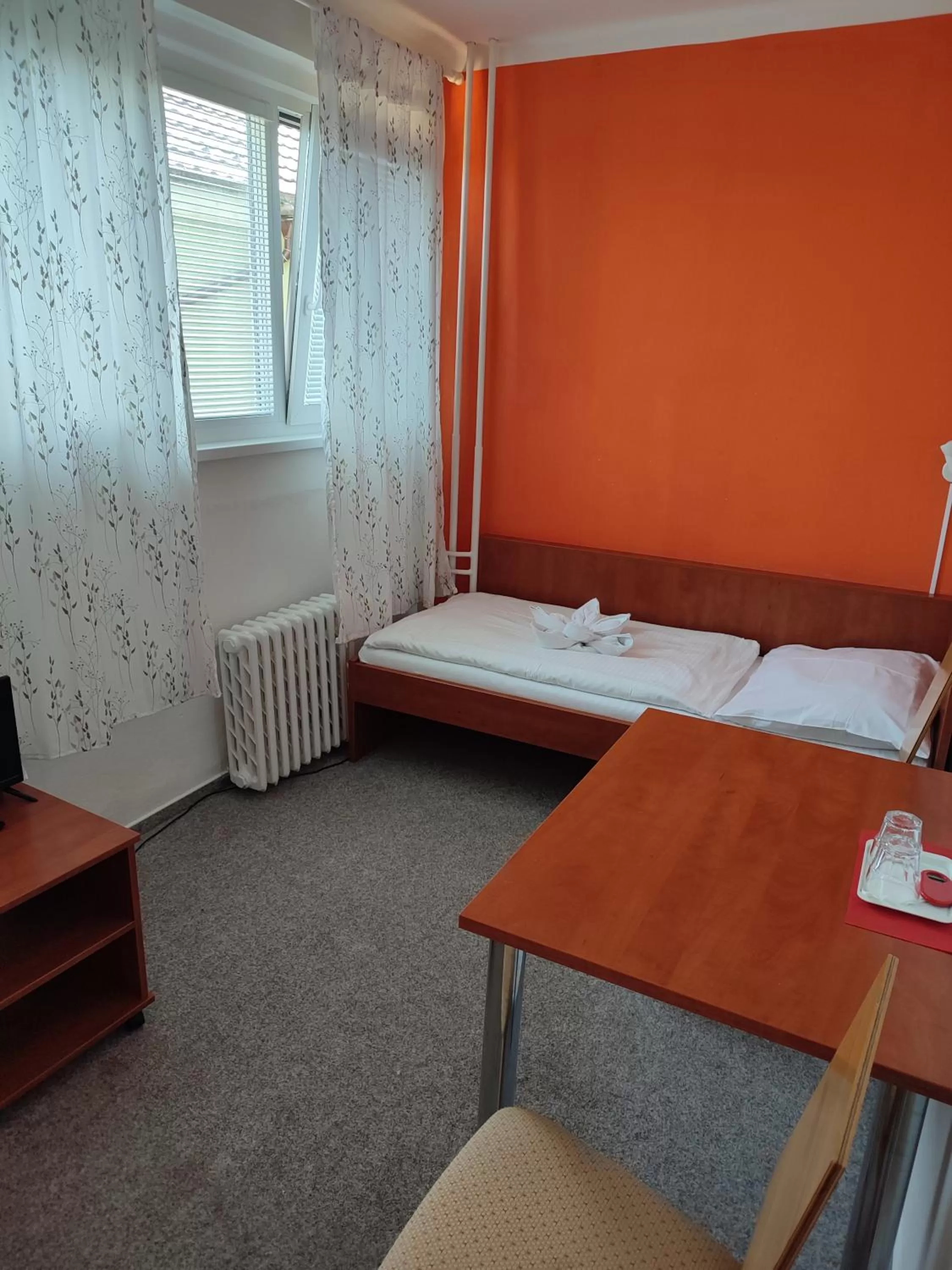 Bed in BEST Hotel Garni