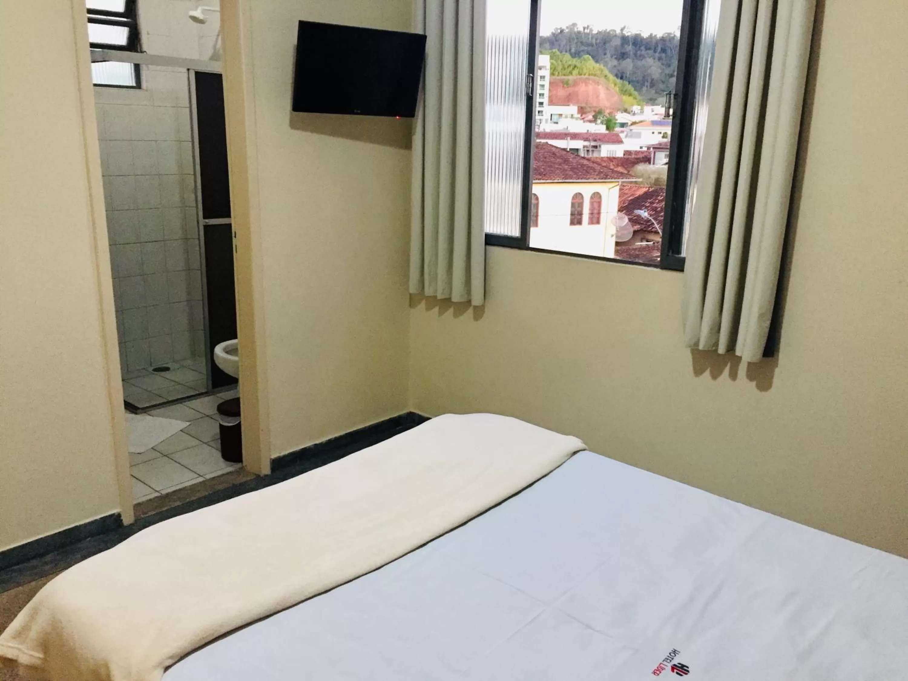 Bed in Hotel Líder - By UP Hotel