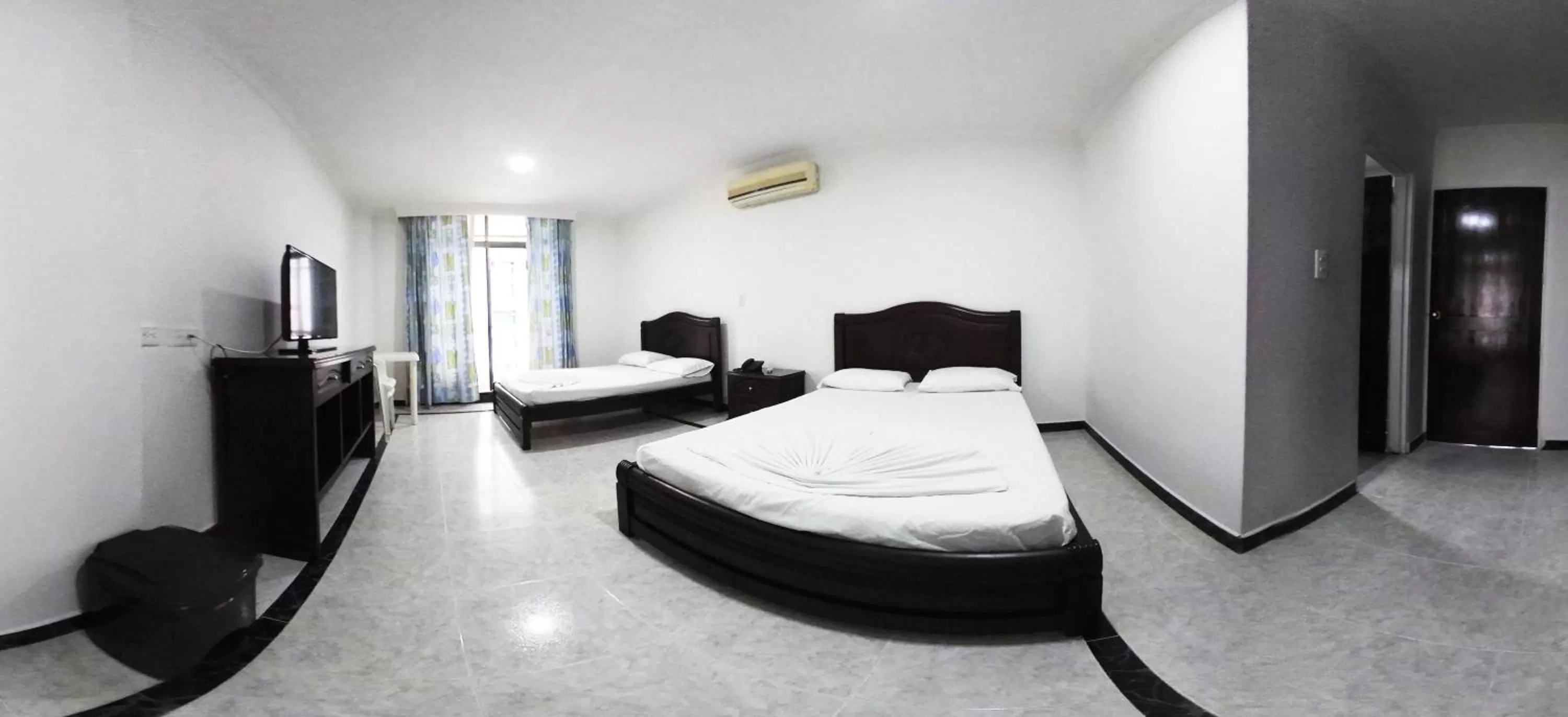 Bed in Zahira Hotel Melgar