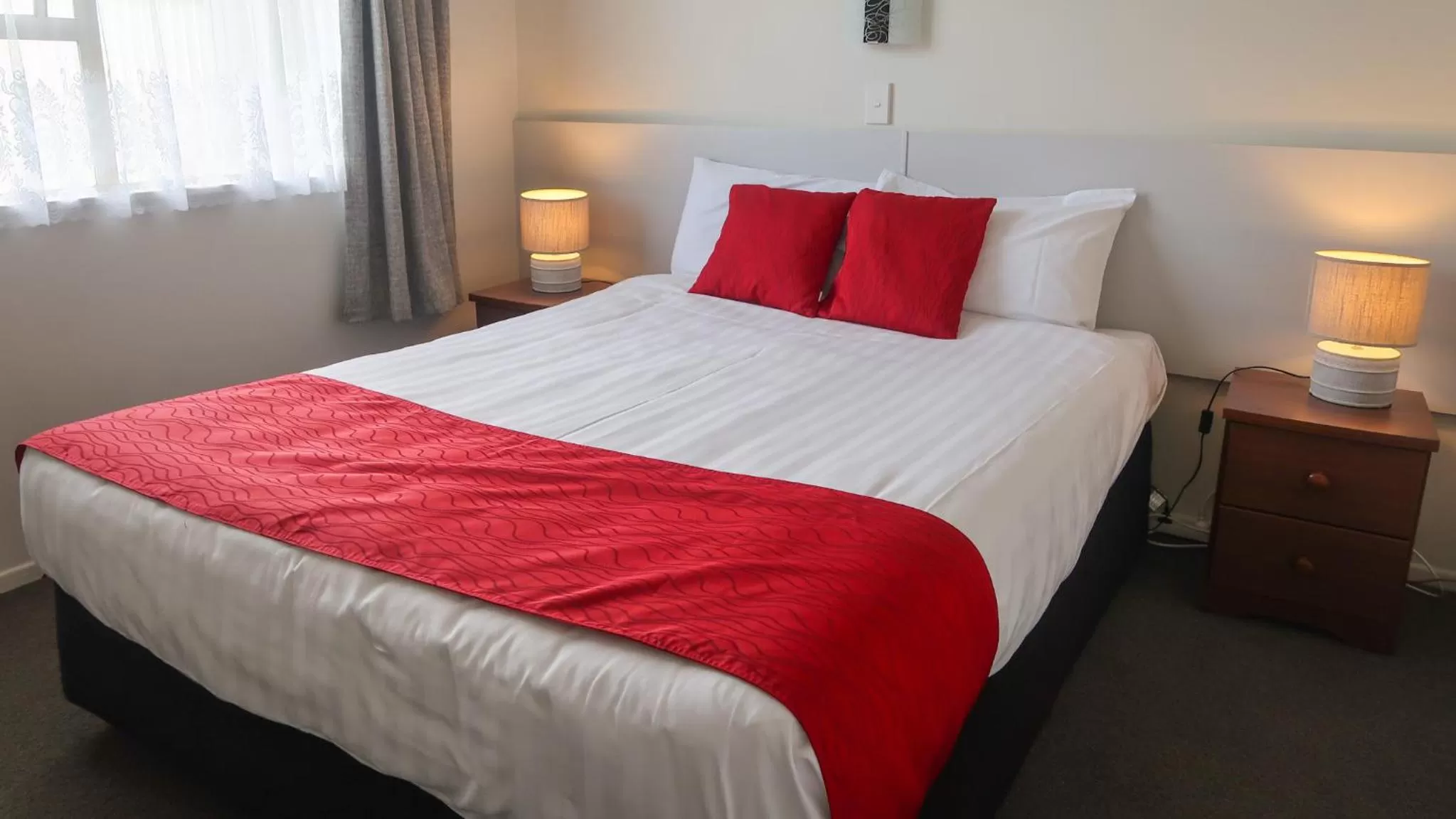 Bed in Fiesta Court Motel