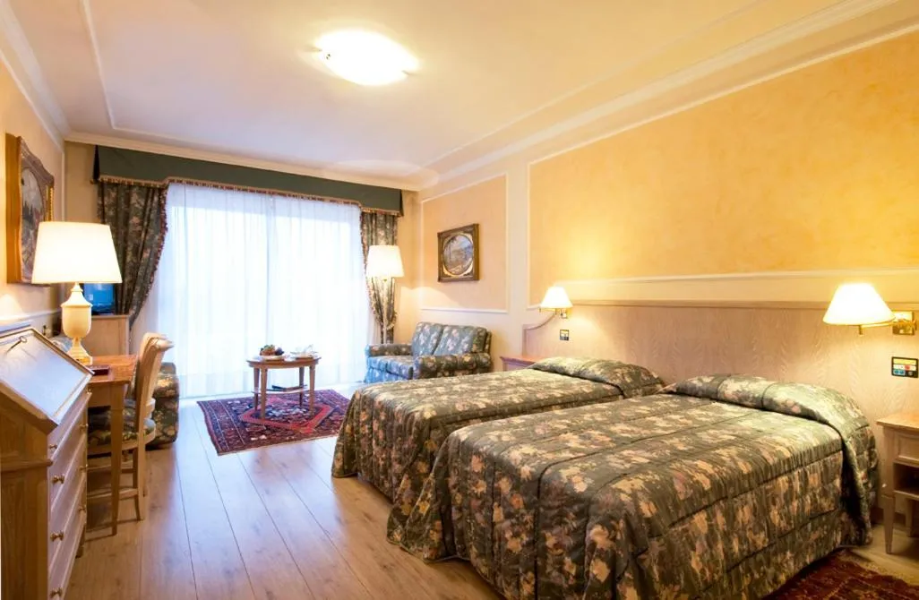 Photo of the whole room, Bed in Grand Hotel Dino