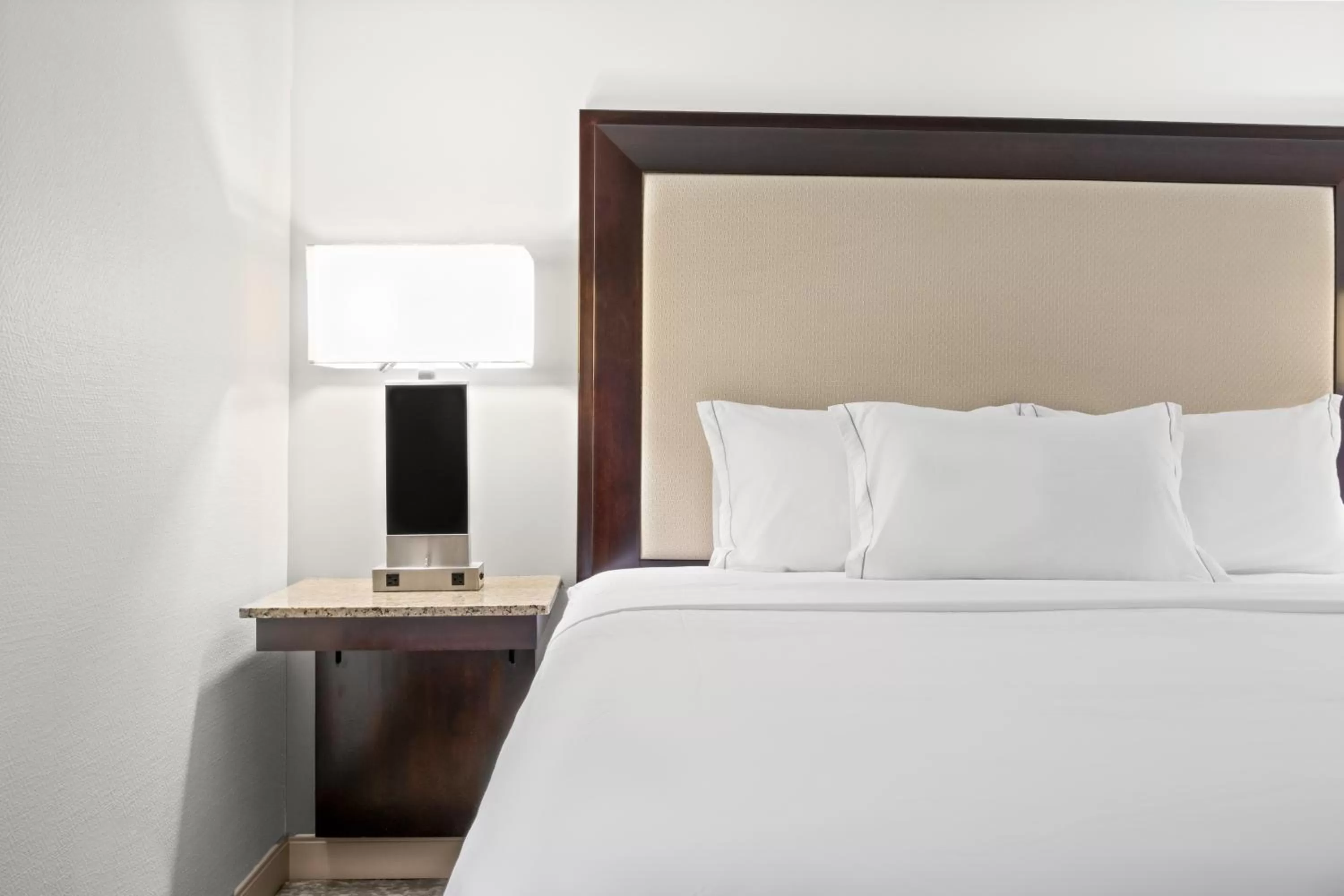 Bed in Woodcliff Hotel and Spa