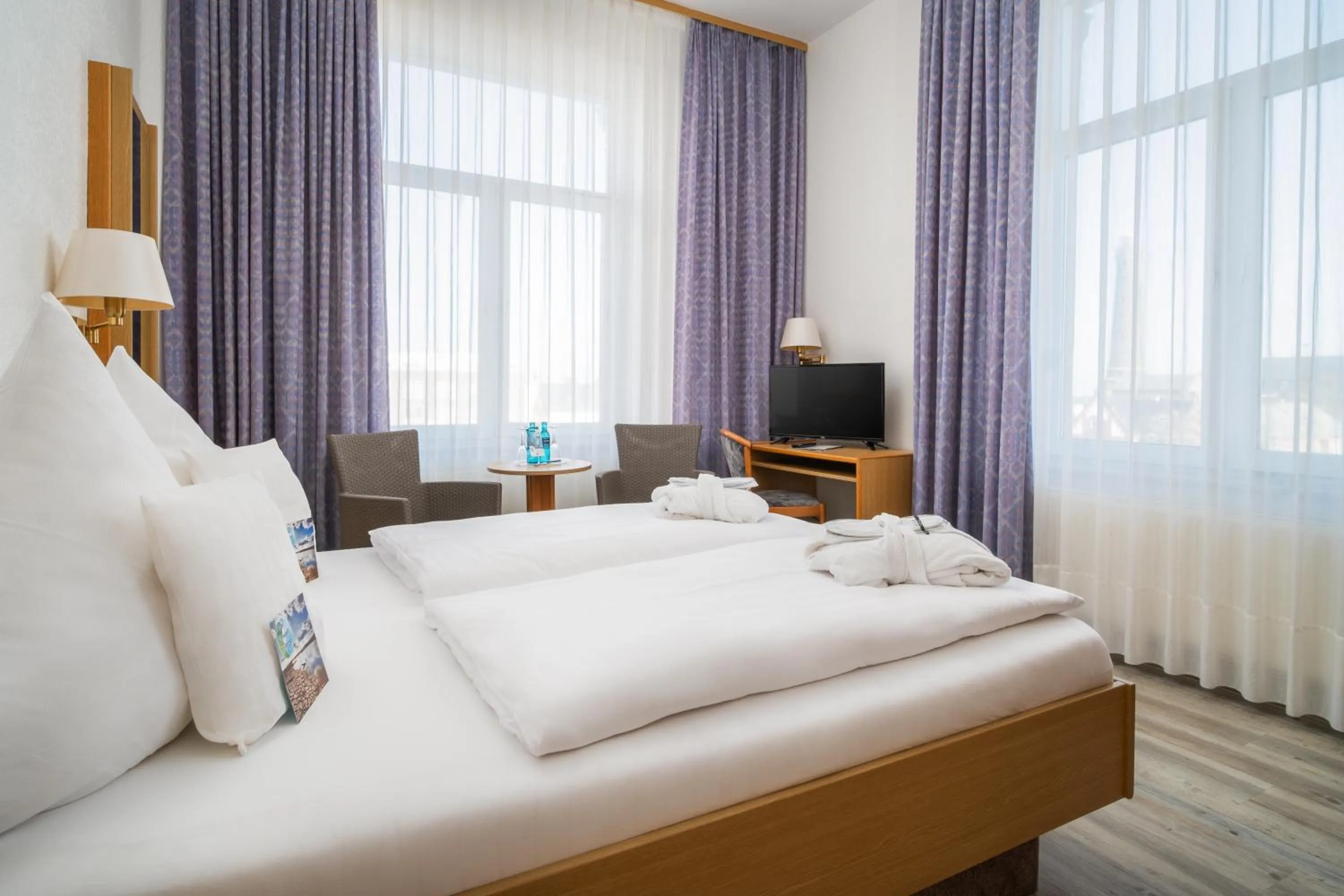 Bed in Nordsee Hotel Borkum