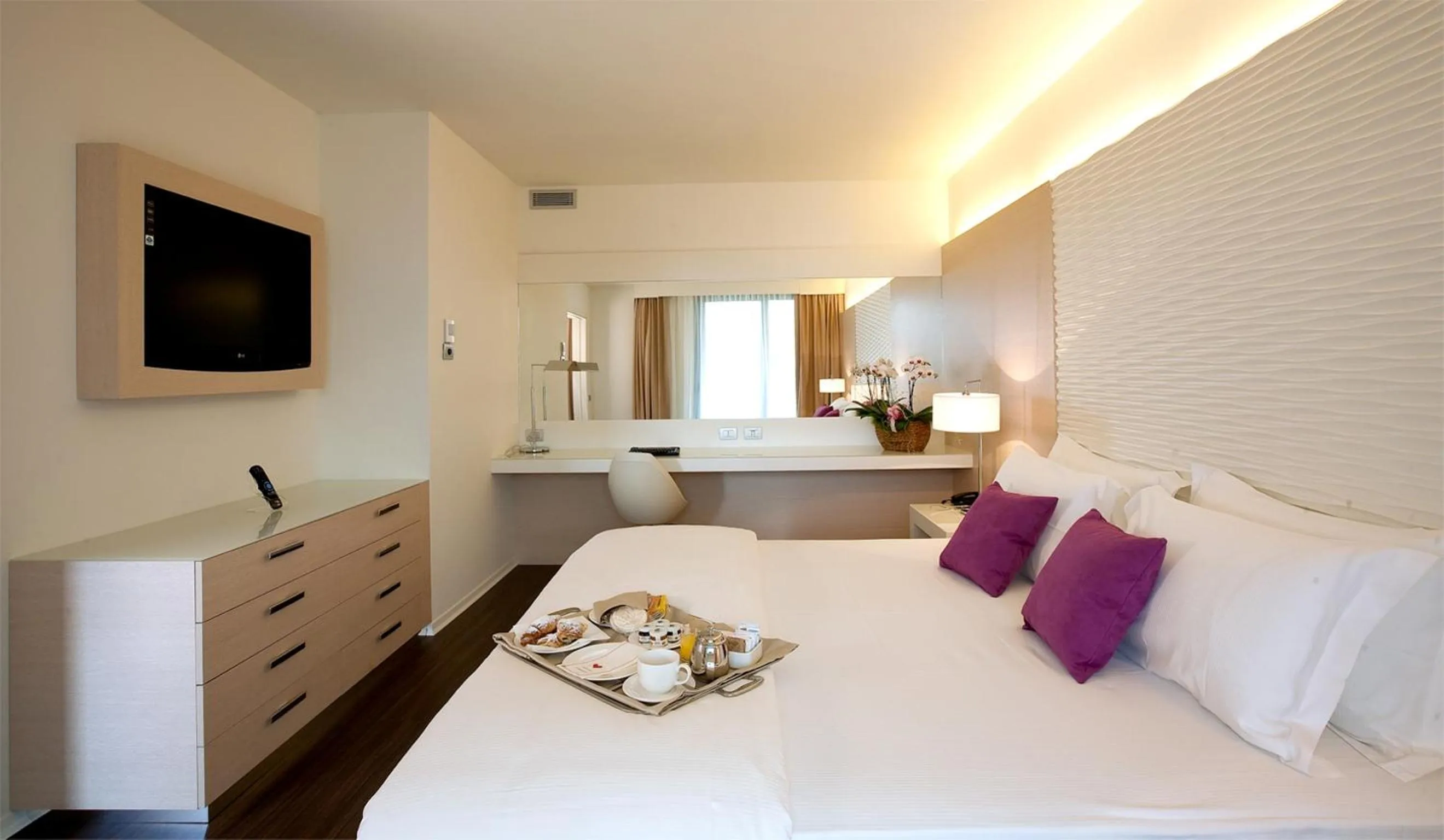 Bed in Laguna Palace Hotel Grado