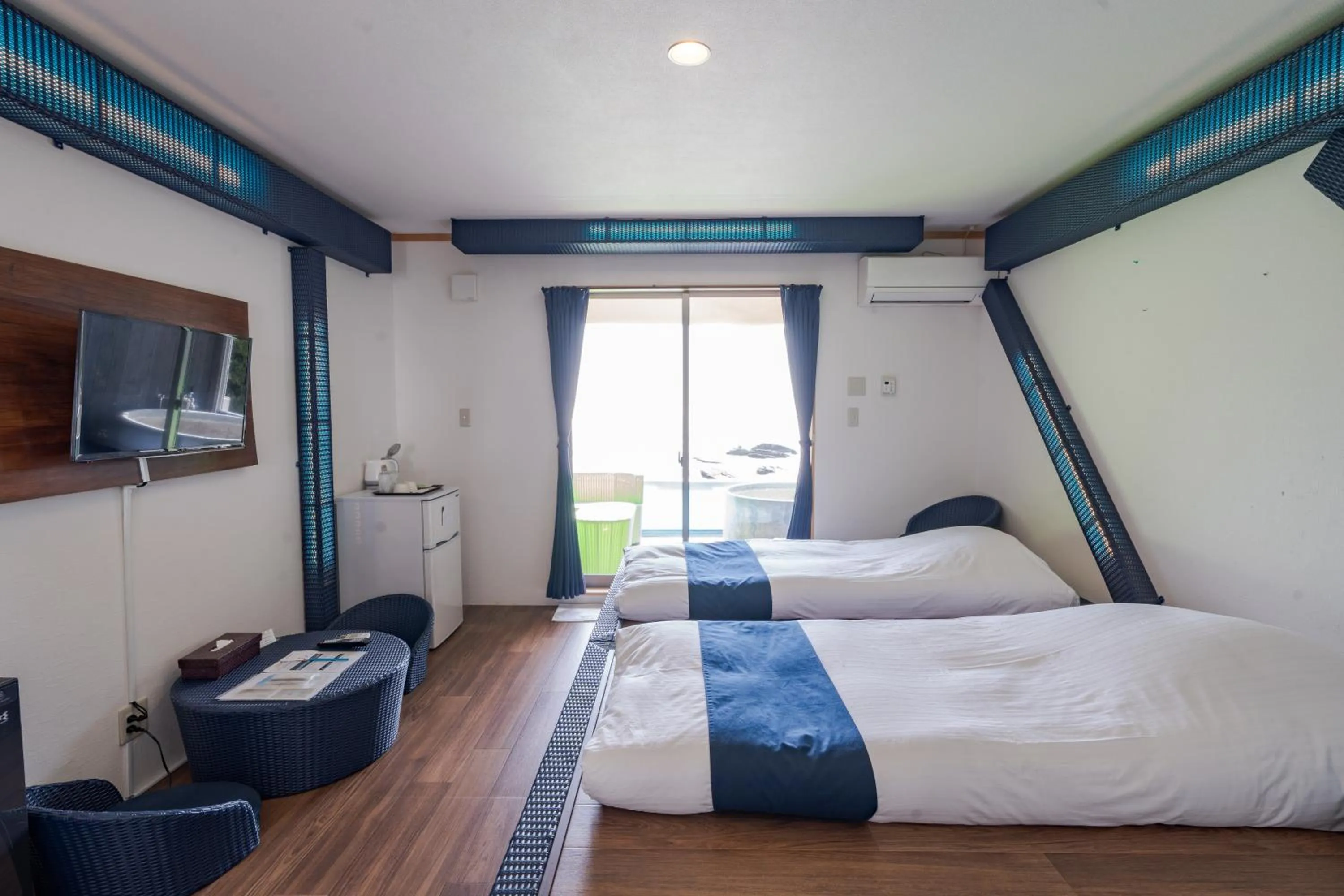 Bed in XYZ Private Spa and Seaside Resort