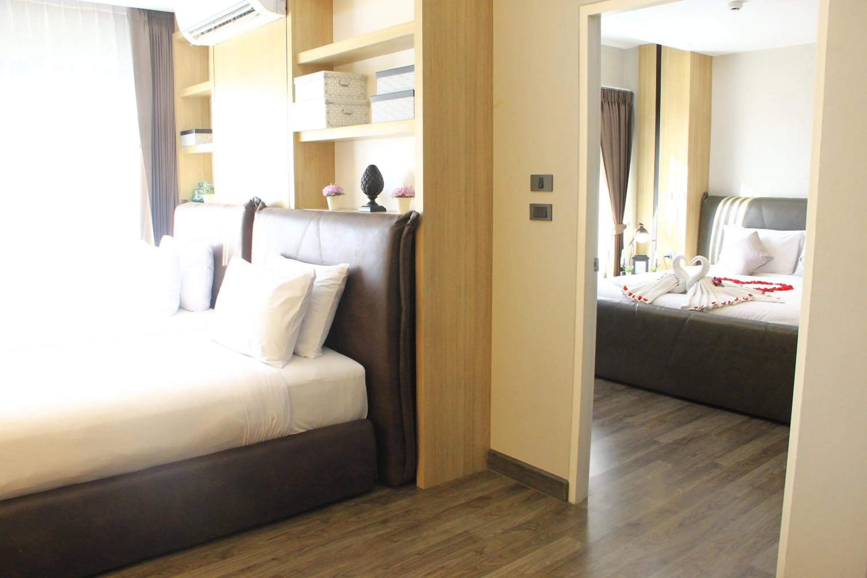 Bed in Wellness Chiang Mai Hotel