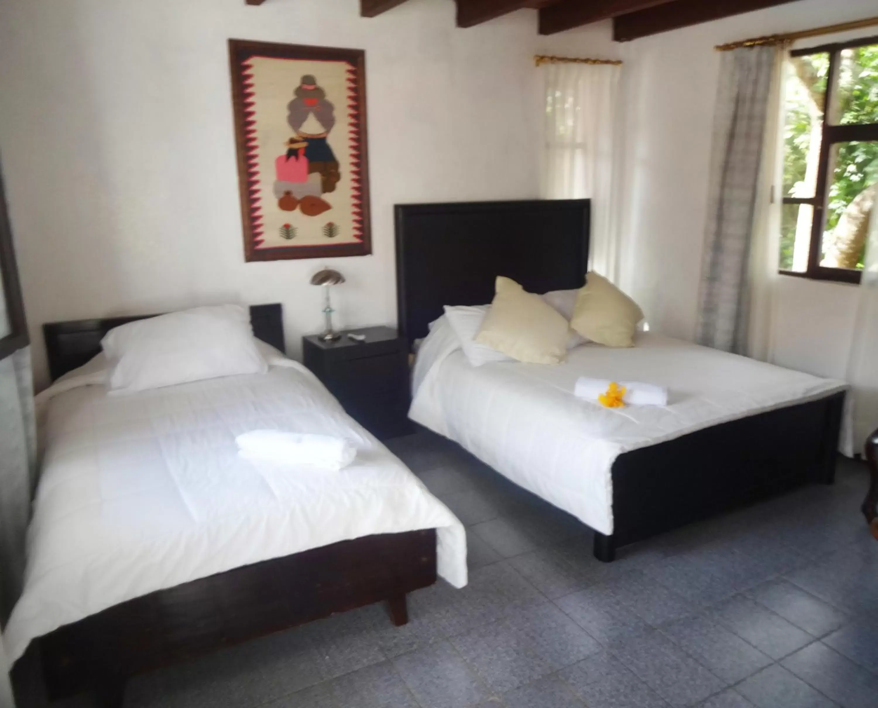 Classic Triple Room - single occupancy in Hosteria Casa Giralda Classic Triple Room - single occupancy in Hosteria Casa Giralda