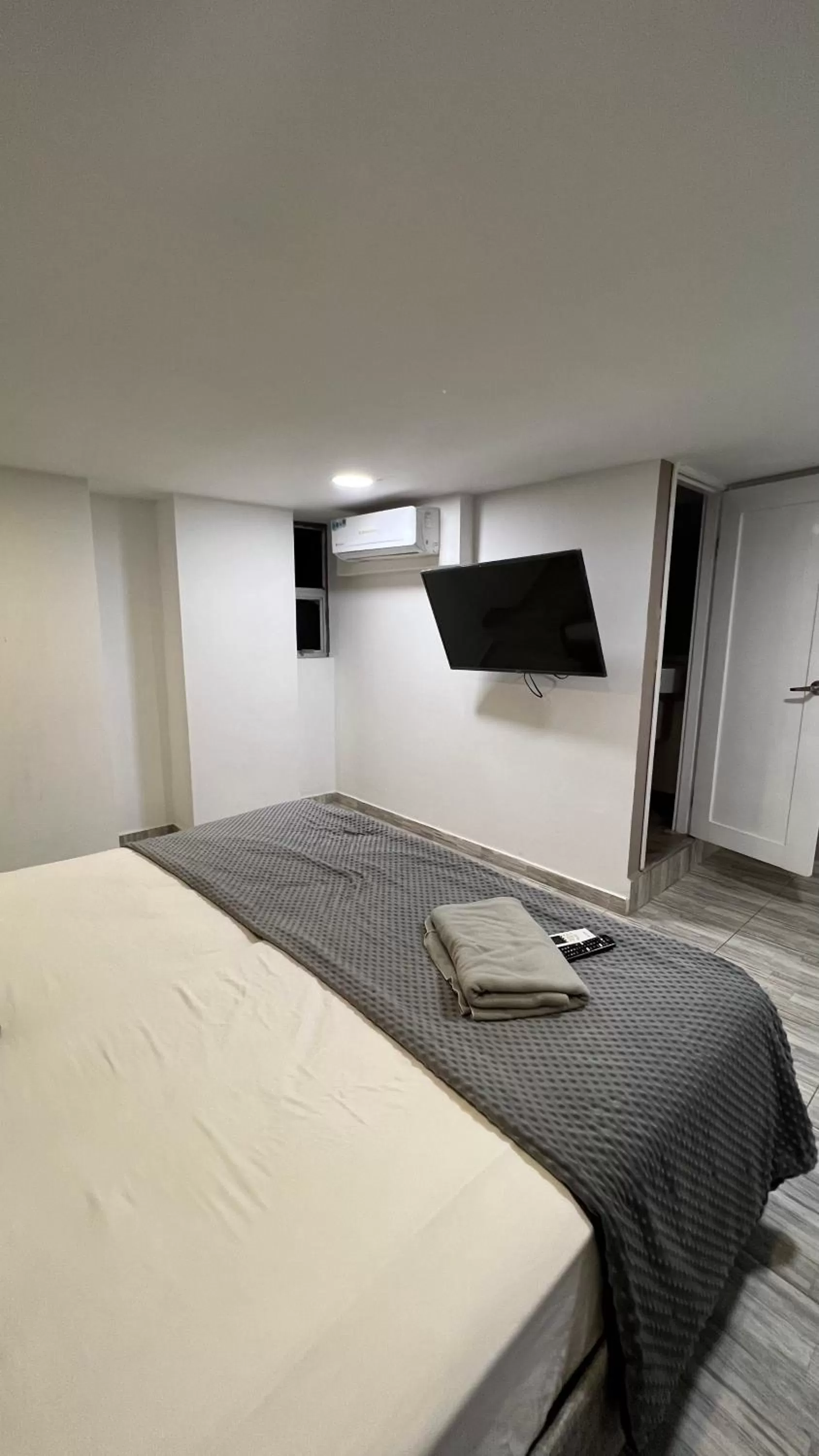 Bed in Bahia 79 Apartasuites Cerca al Centro