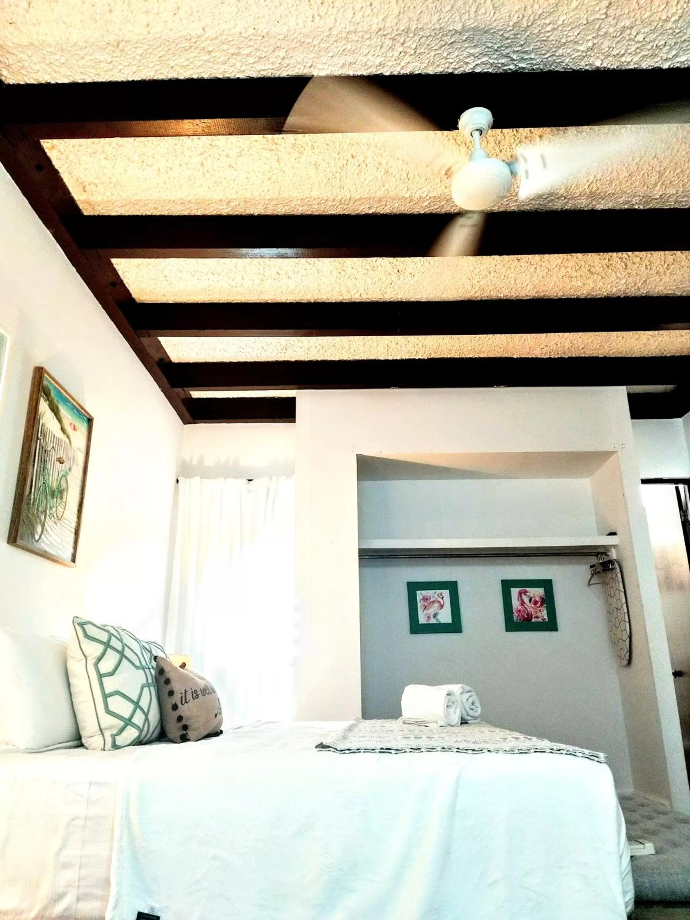 Photo of the whole room, Bed in La Capitana Old San Juan Building