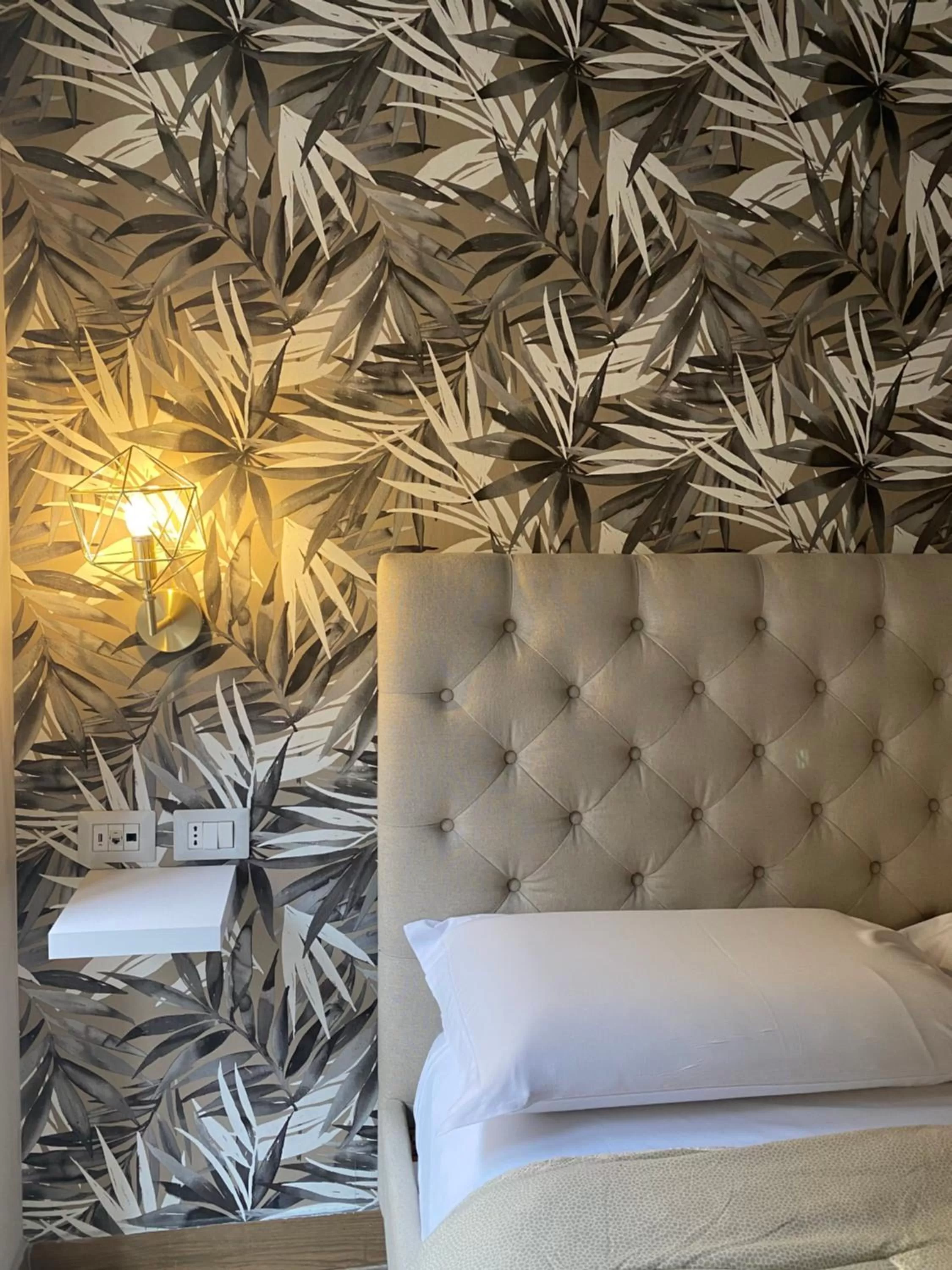 Bed, Seating Area in B&B Partenopeo