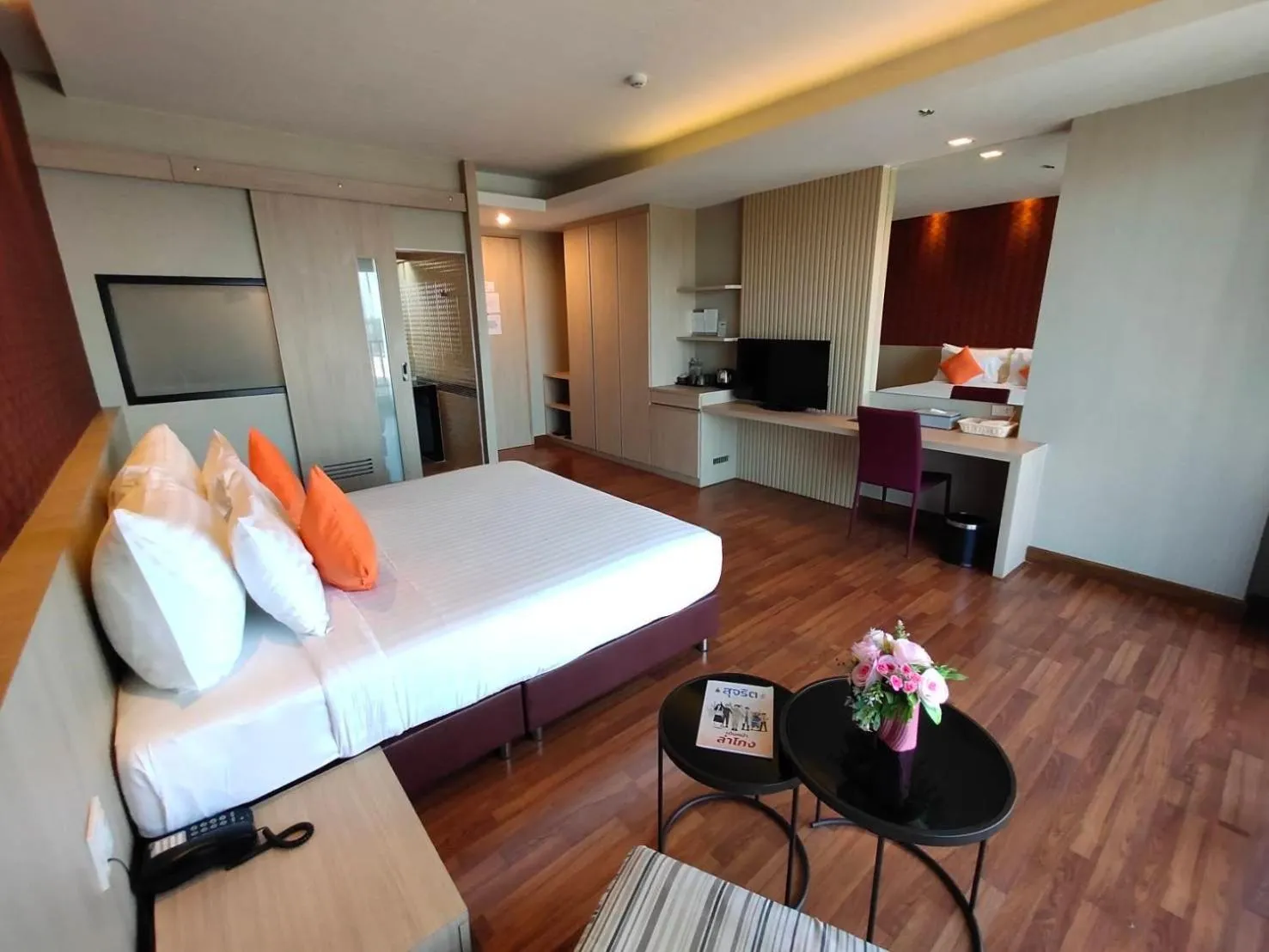 Bed in Tonaoi Grand Hotel