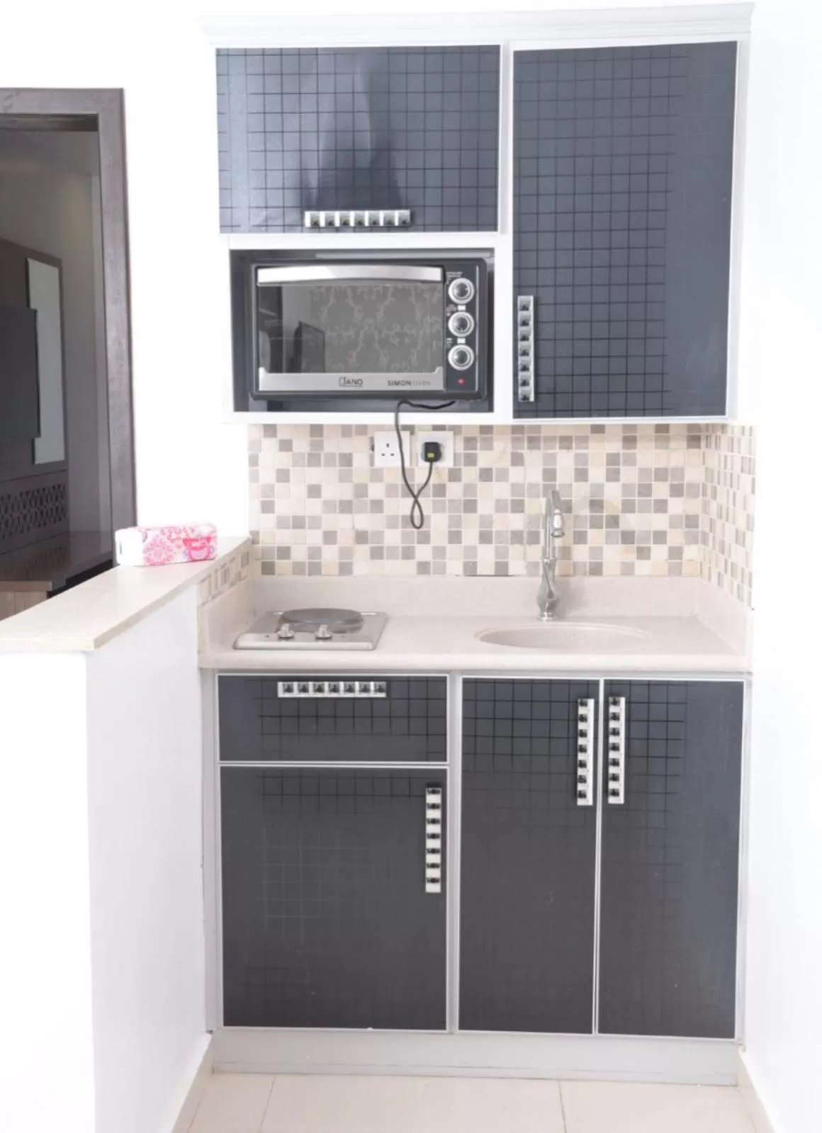 Kitchen or kitchenette in شقق ارين البساتين