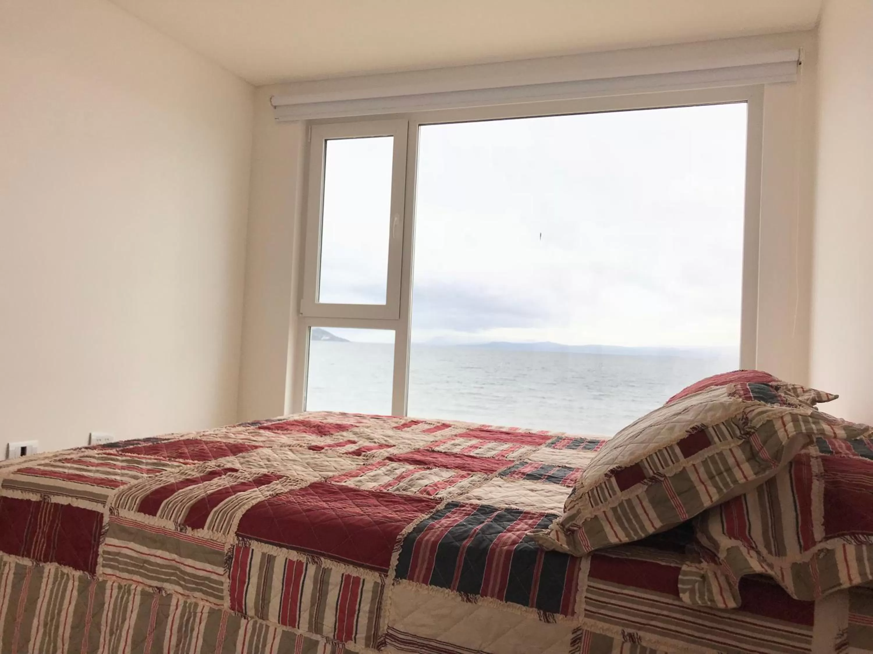 Bed in De la Costa Apartamentos