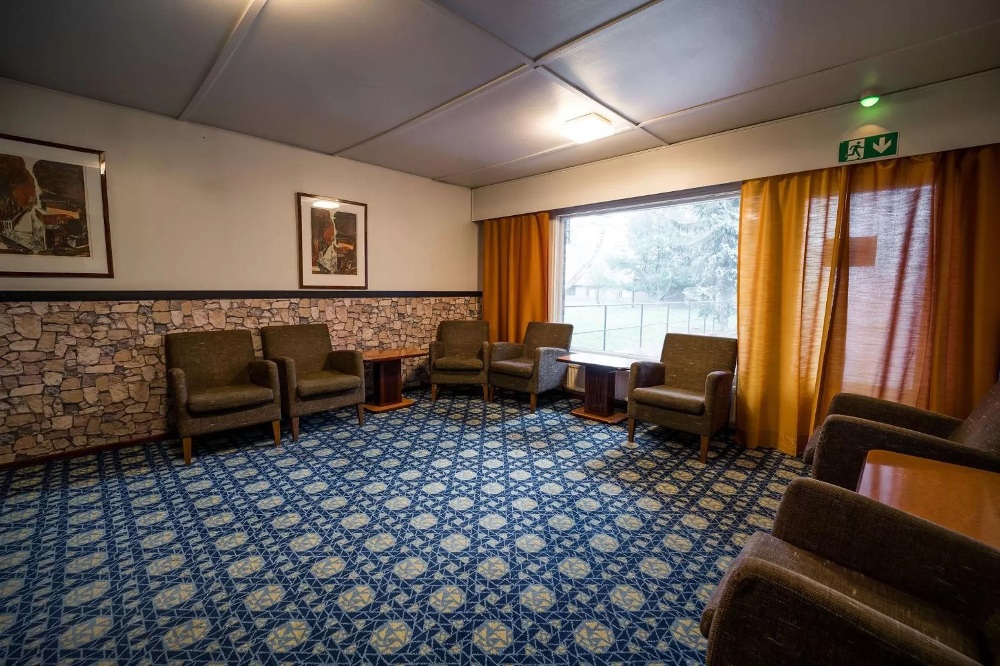 Communal lounge/ TV room in Budget Hotel Raahe