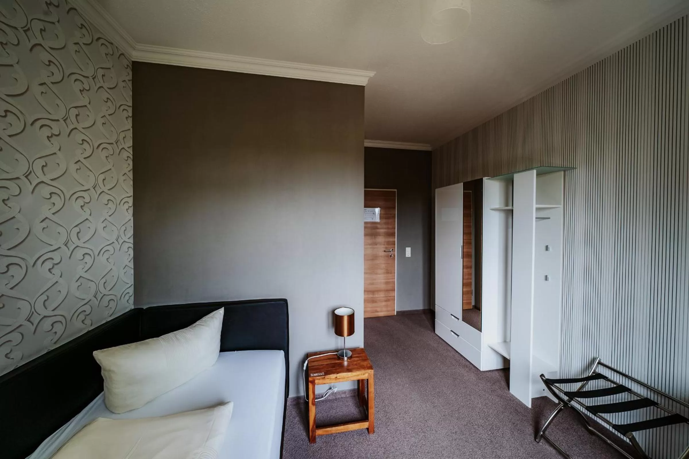 Photo of the whole room, Bed in RobrookS Hotel Garni