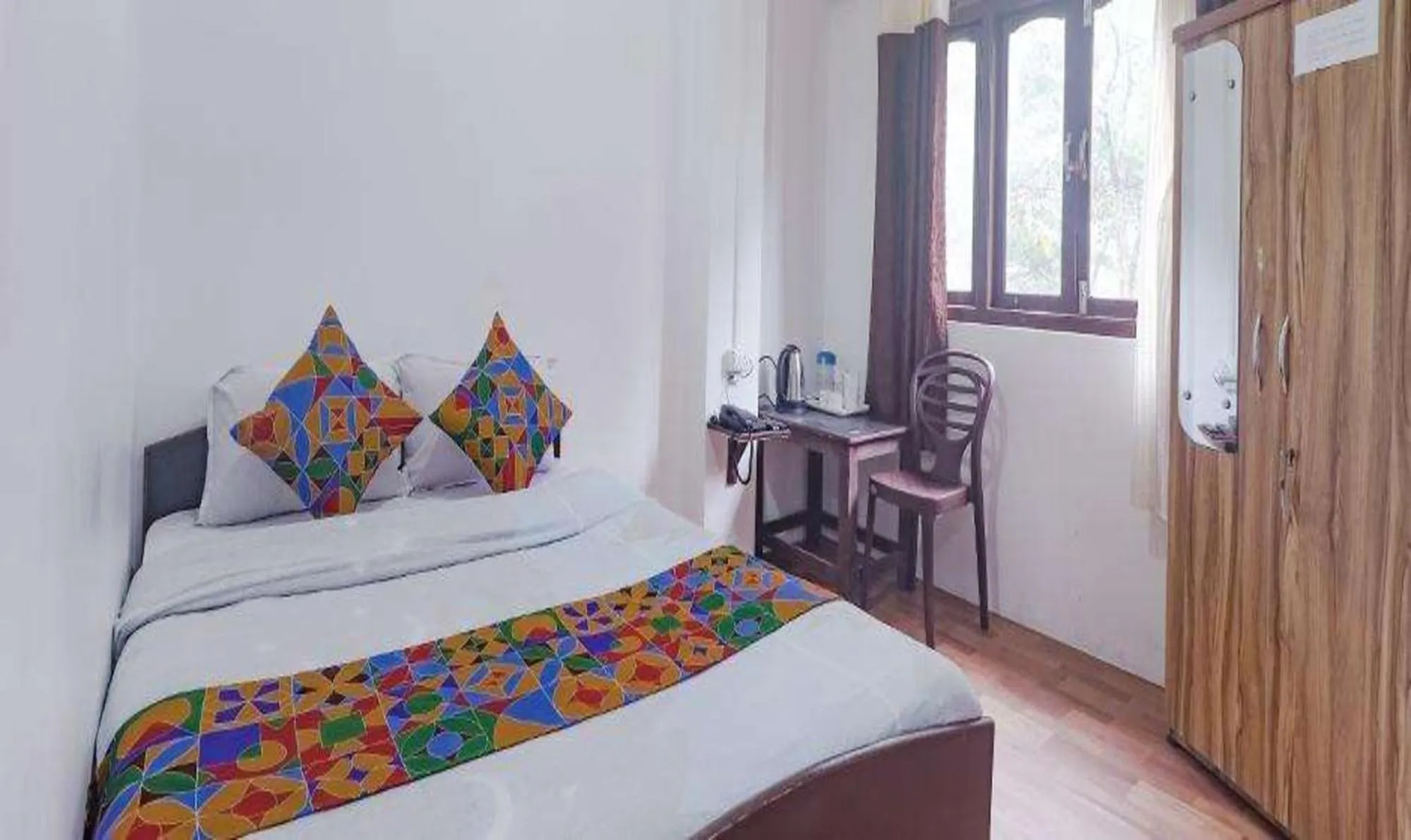 Bed in FabExpress Laxmi Niwas