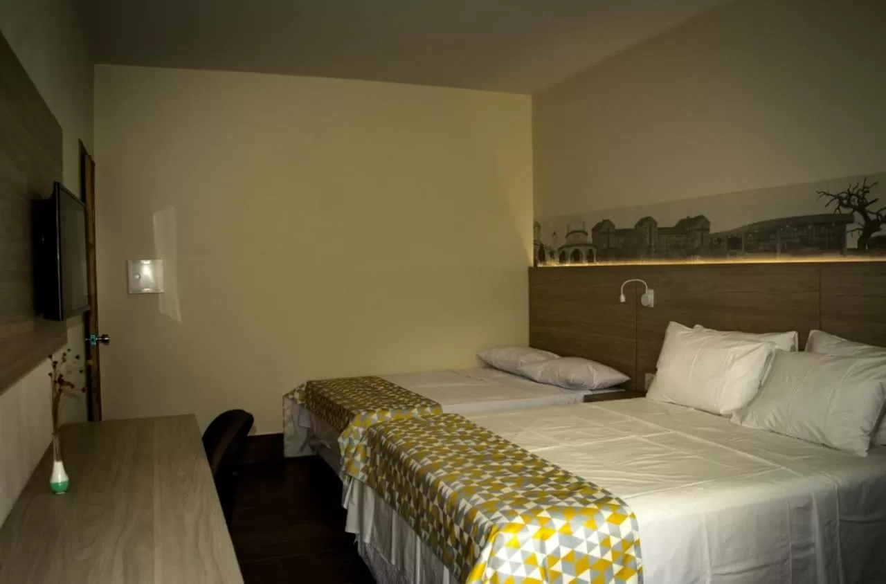 Photo of the whole room, Bed in Pousada Araxá