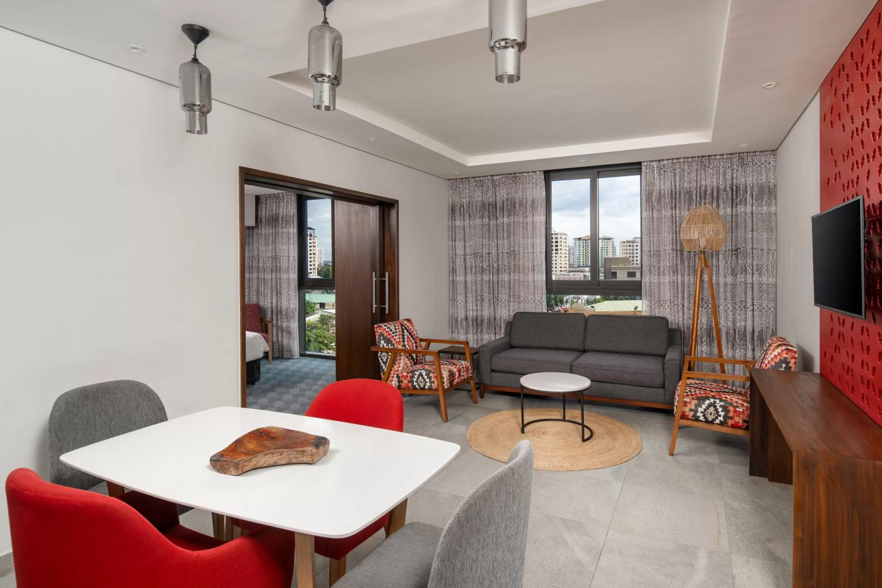 Communal lounge/ TV room in Crowne Plaza - Dar Es Salaam by IHG