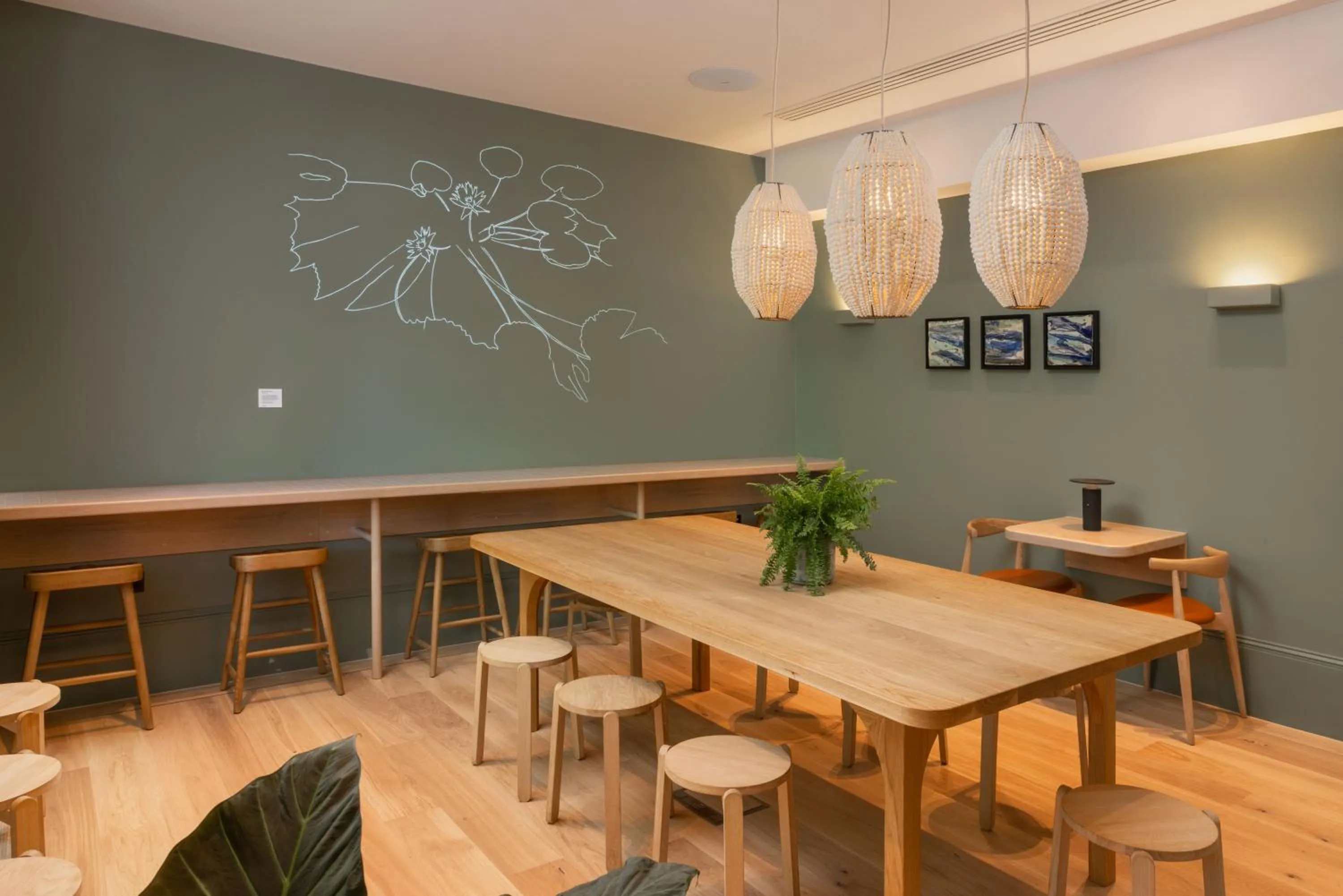 Dining area in Inhabit Queen's Gardens, a Member of Design Hotels