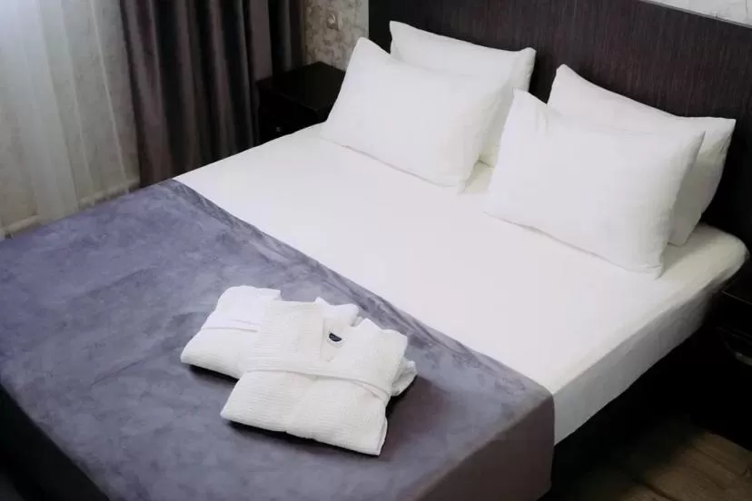 Bed in Rush Hotel