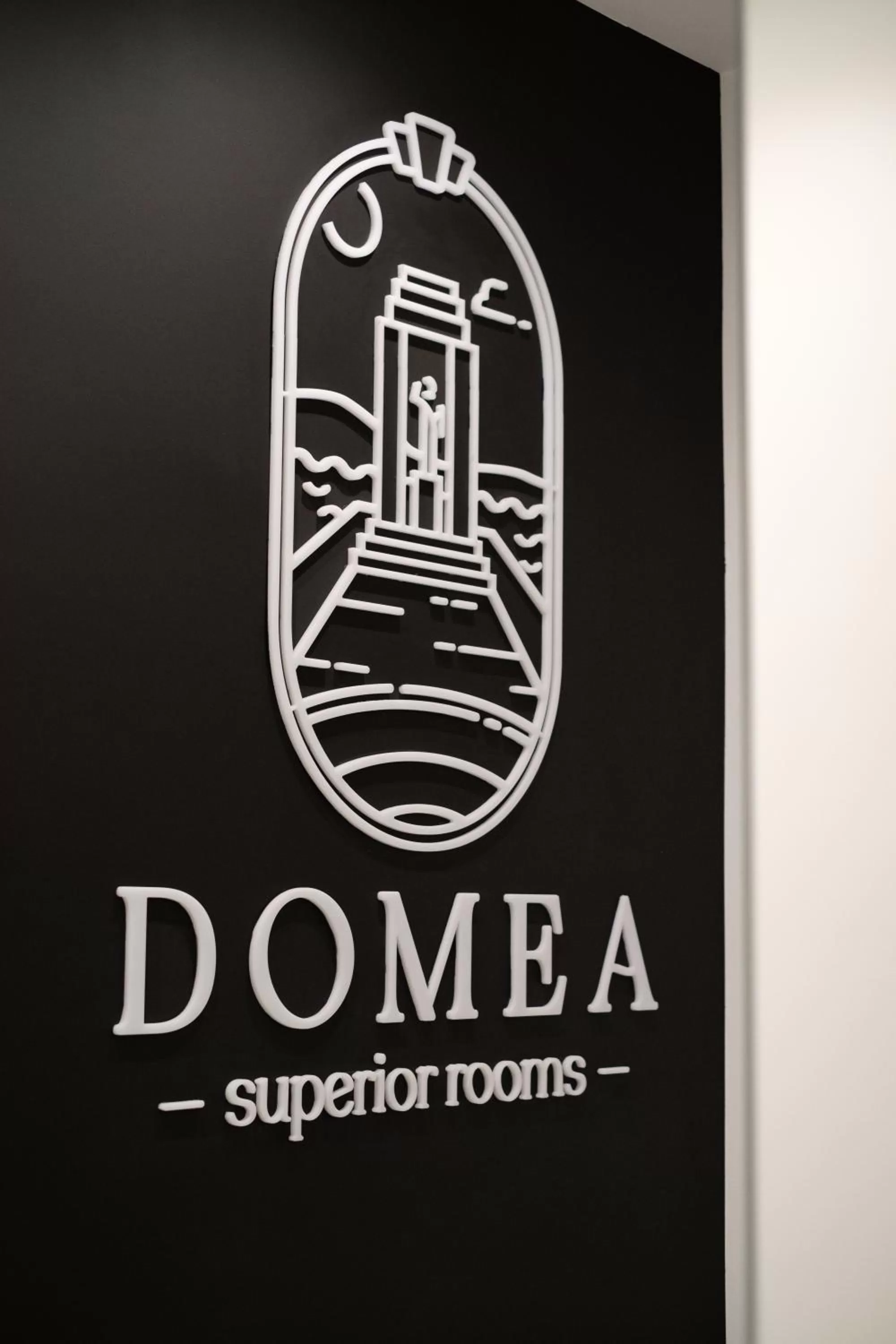 Property logo or sign in Domea Superior Rooms Bed and Breakfast