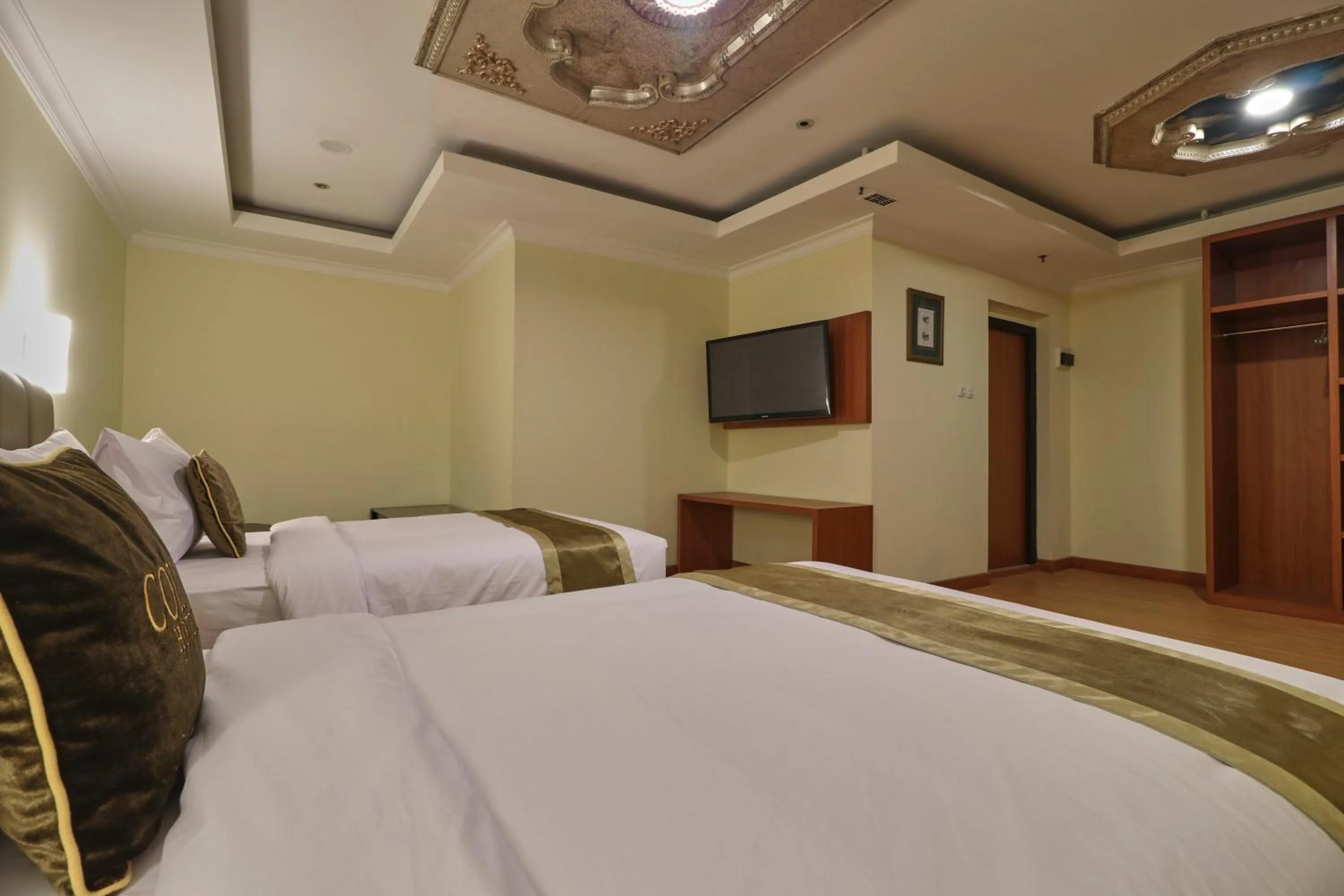 Bed in Coins Hotel Jakarta