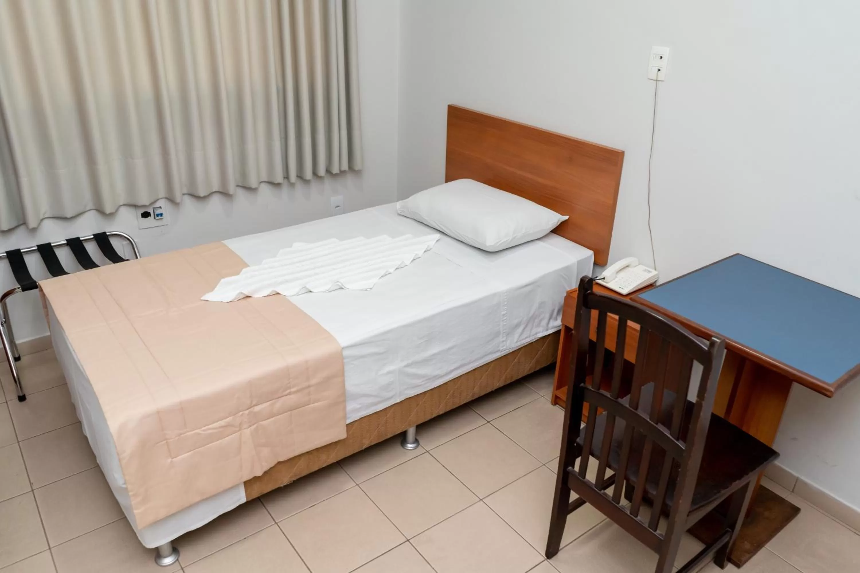 Bed in Bandeirantes Hotel