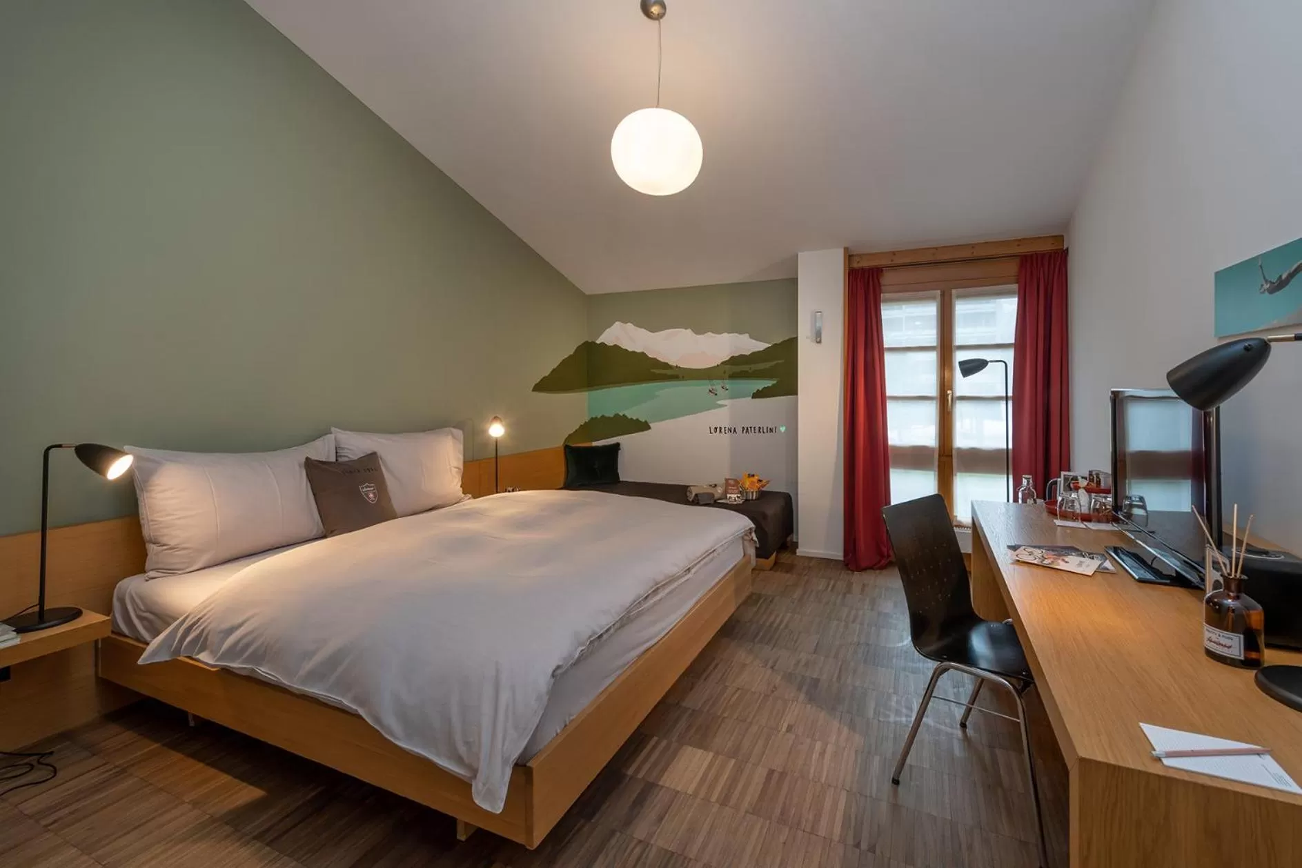 Photo of the whole room, Bed in Hotel Schweizerhof Lenzerheide