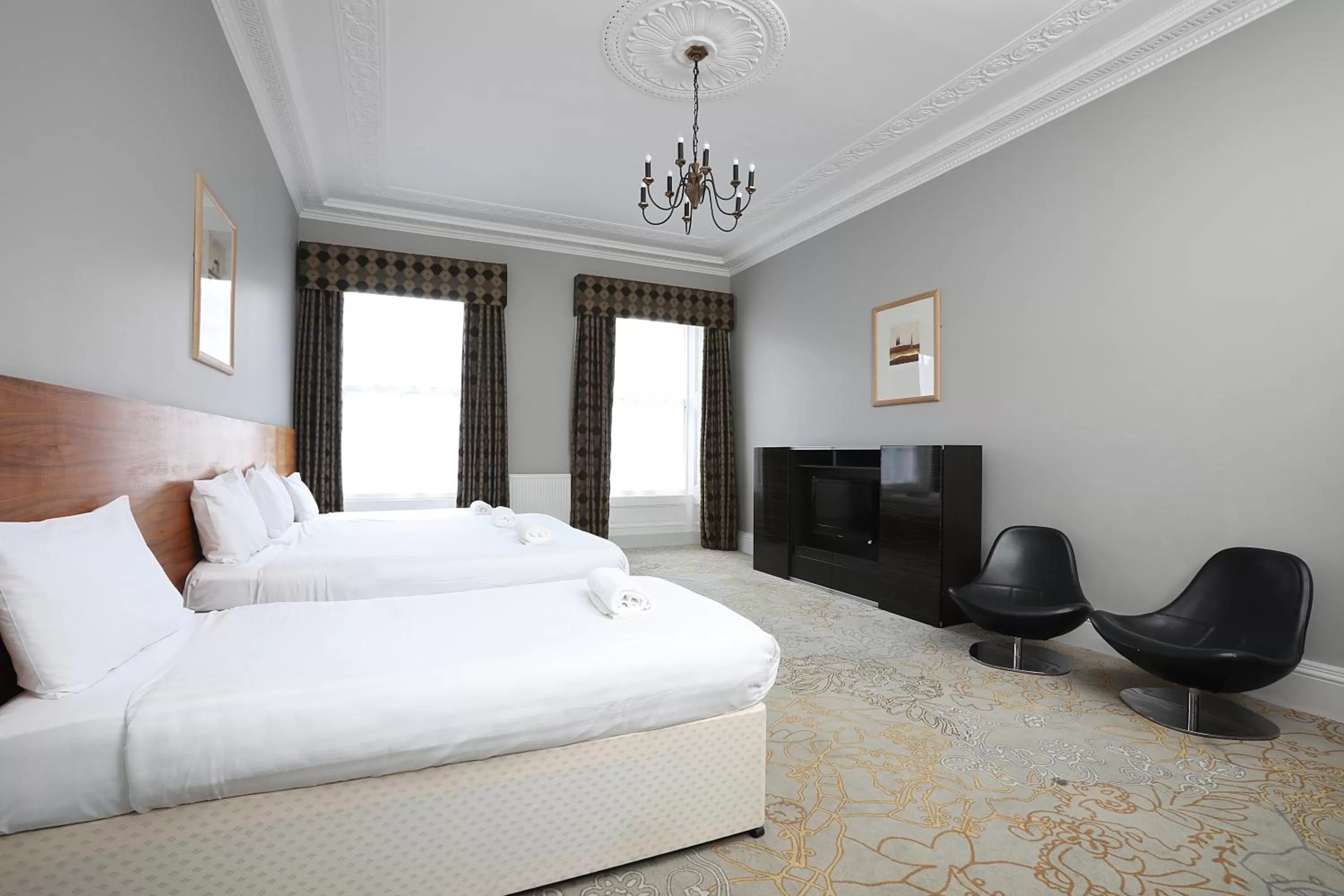 Bed in Cairn Hotel & Apartments