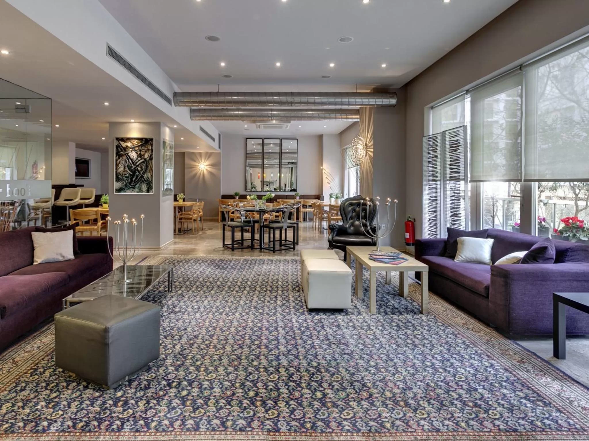 Communal lounge/ TV room in Polis Grand Hotel