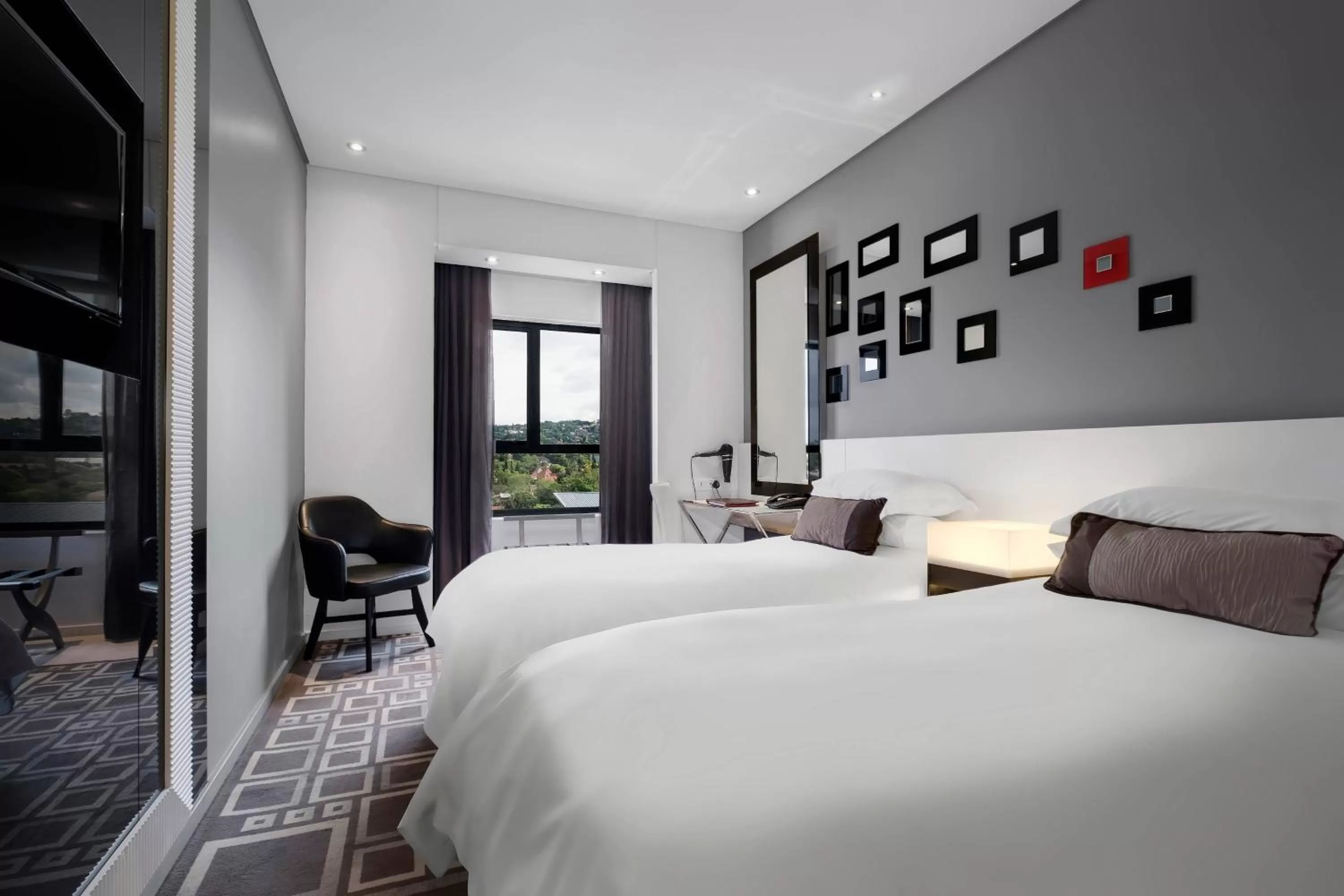 Photo of the whole room, Bed in Protea Hotel Fire & Ice! by Marriott Pretoria Menlyn