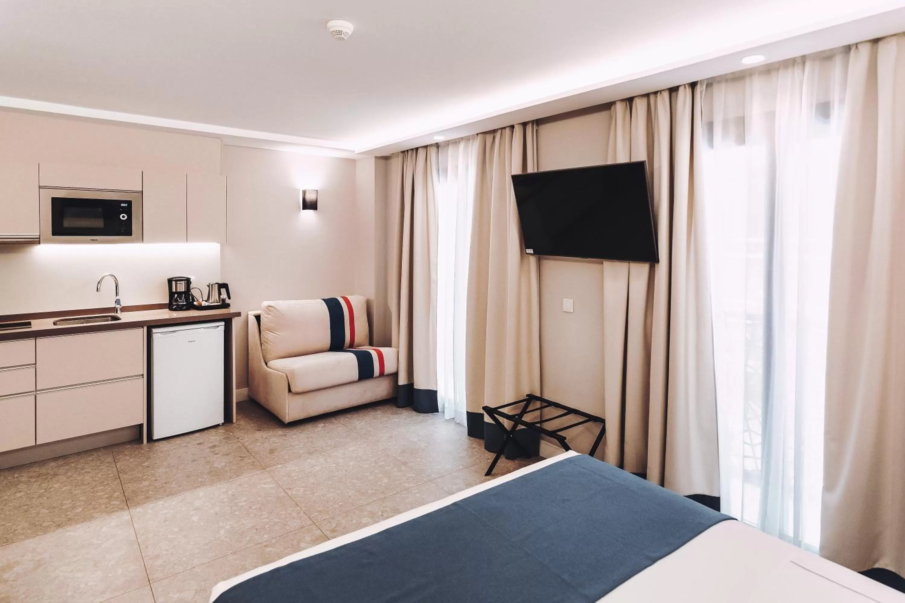 TV and multimedia, Bed in Posidonia Aparthotel