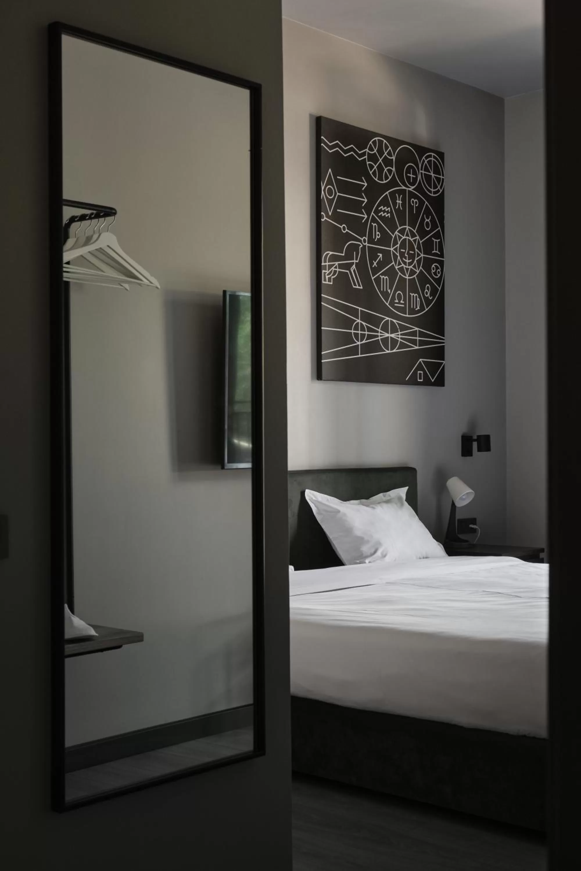 Bed in Sapiens Hotel