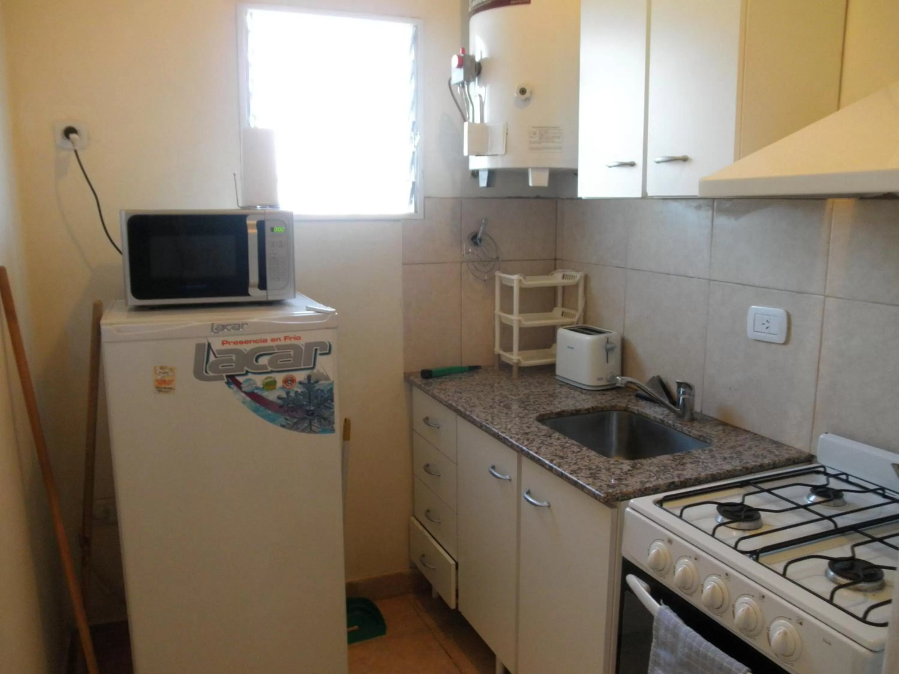 Kitchen or kitchenette in Complejo Solar Apart