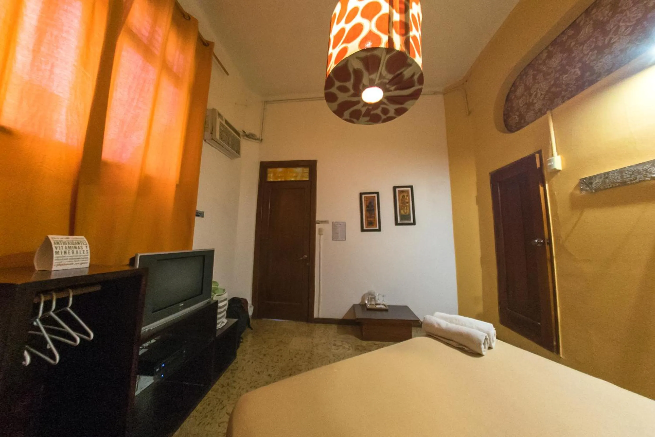 Photo of the whole room, TV/Entertainment Center in Manso Boutique Guest House
