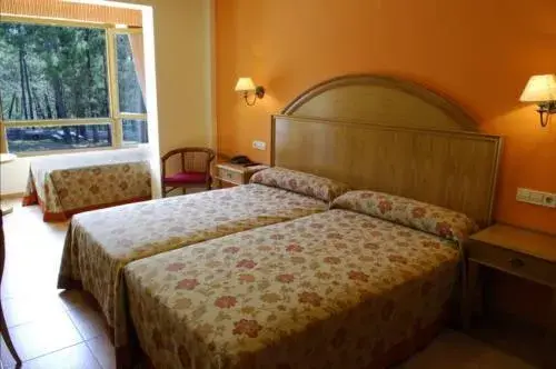 Triple Room in Hotel Abeiras Triple Room in Hotel Abeiras