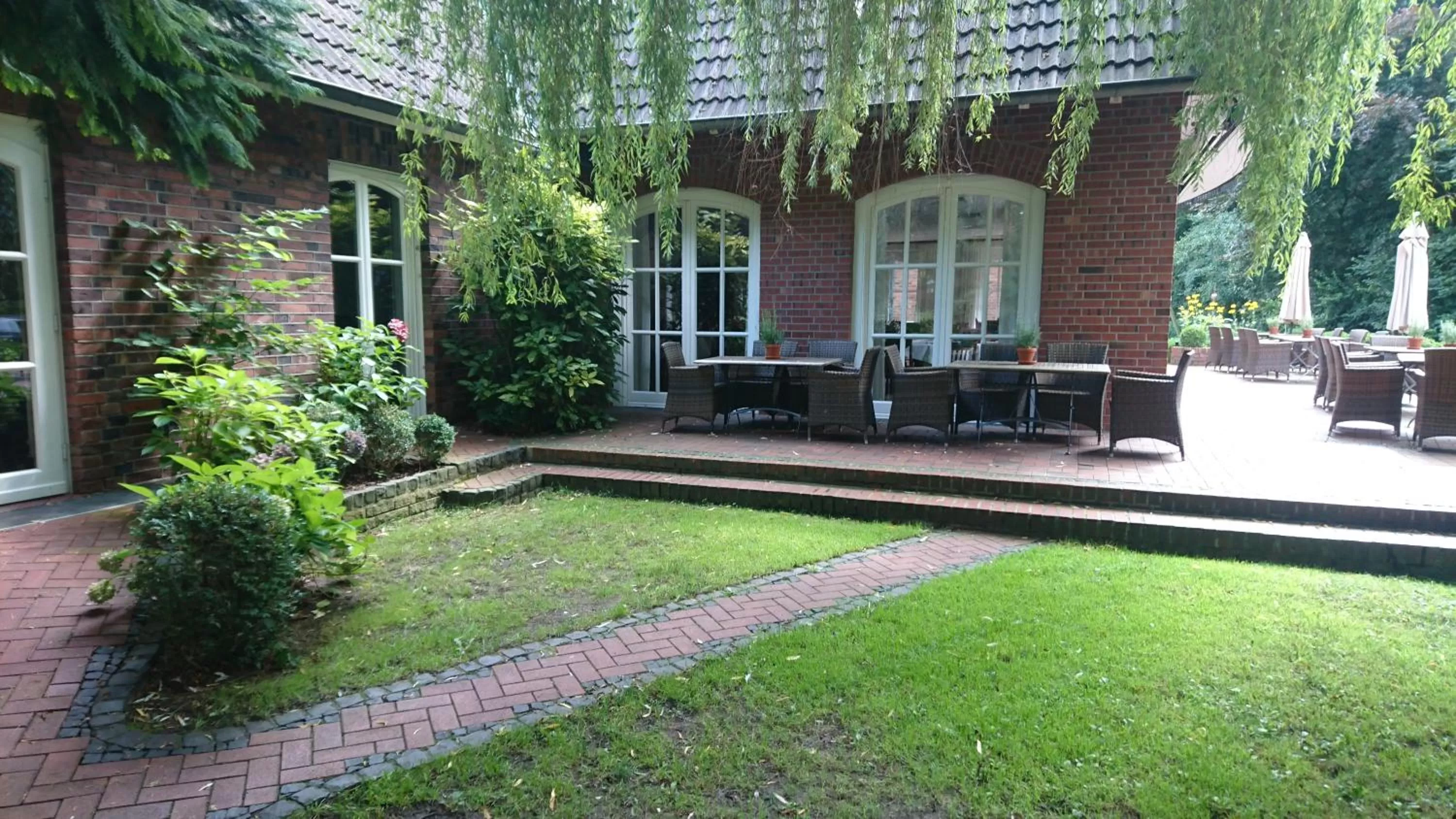 Facade/entrance, Garden in Waldhaus an de Miälkwellen